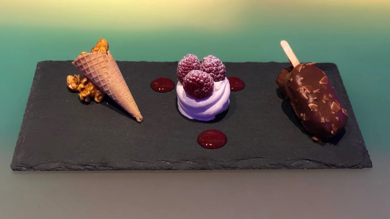 The “Celebration Trio:” a mini magnum, raspberry pavlova and a crispy cone with caramel popcorn, a combination reminiscent of movie theater concession stand treats.