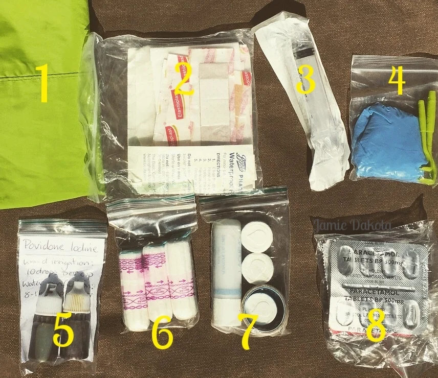 A backpack filled with multiple tubes of toothpaste, a toothbrush, and various holders for the toothbrush and toothpaste.