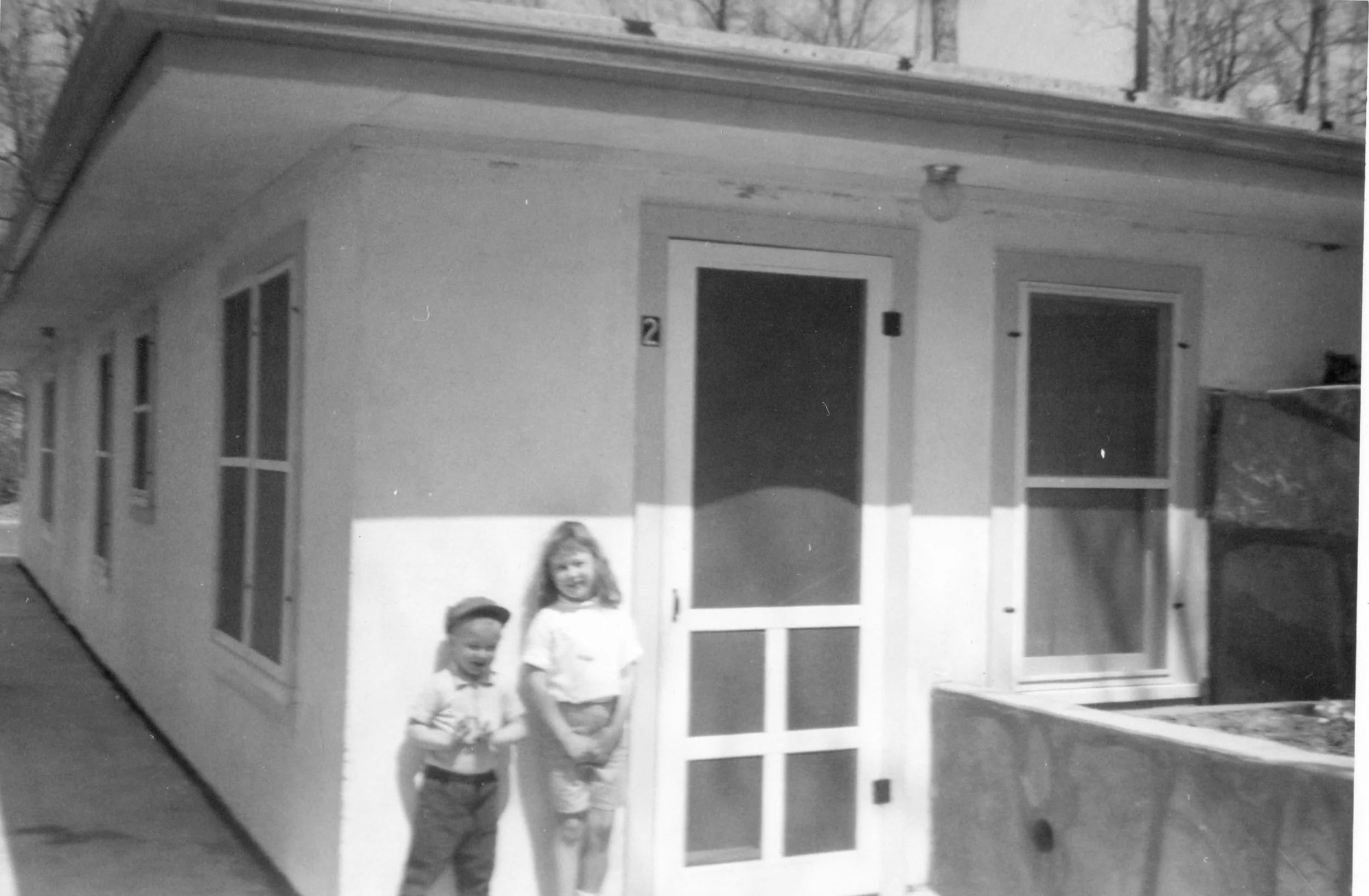 Cabins #1 & 2 complete, with the grandchildren Carol and brother