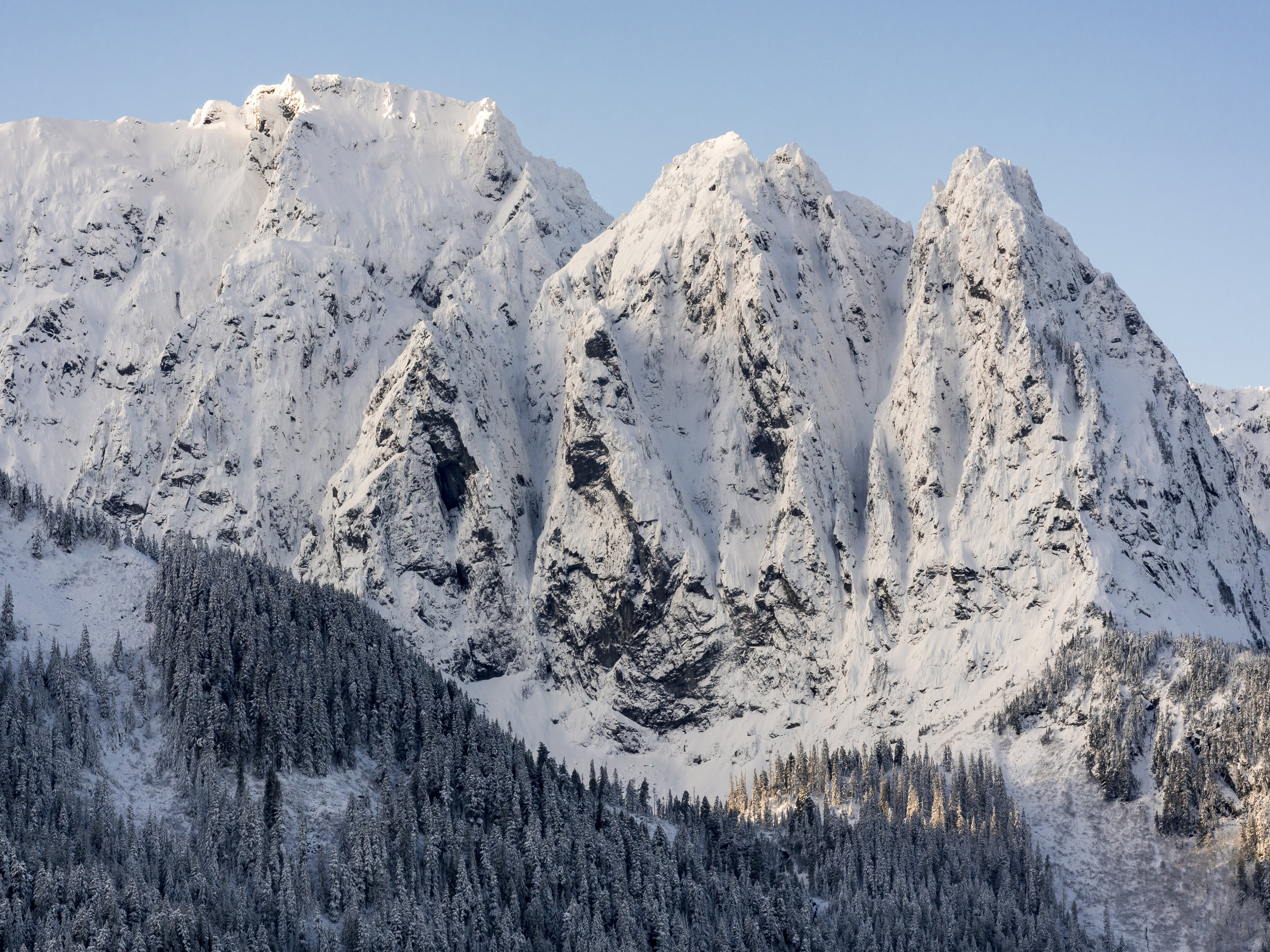 Amazing Detailed Sharp Peaks of Mount Index Covered in Winter Snow with Blue Sky Background