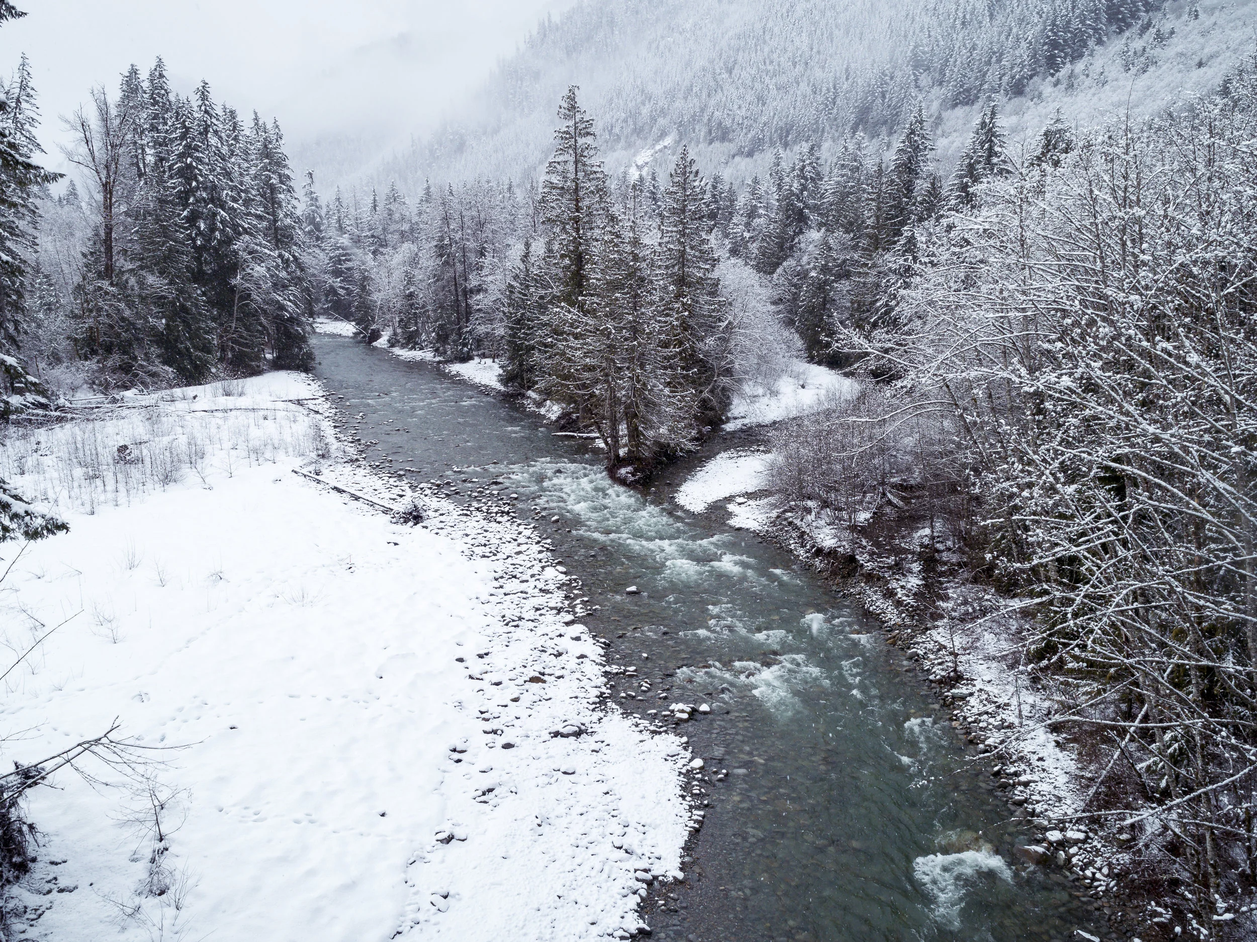 Aerial_of_River_in_Winter_Wonderland.jpg