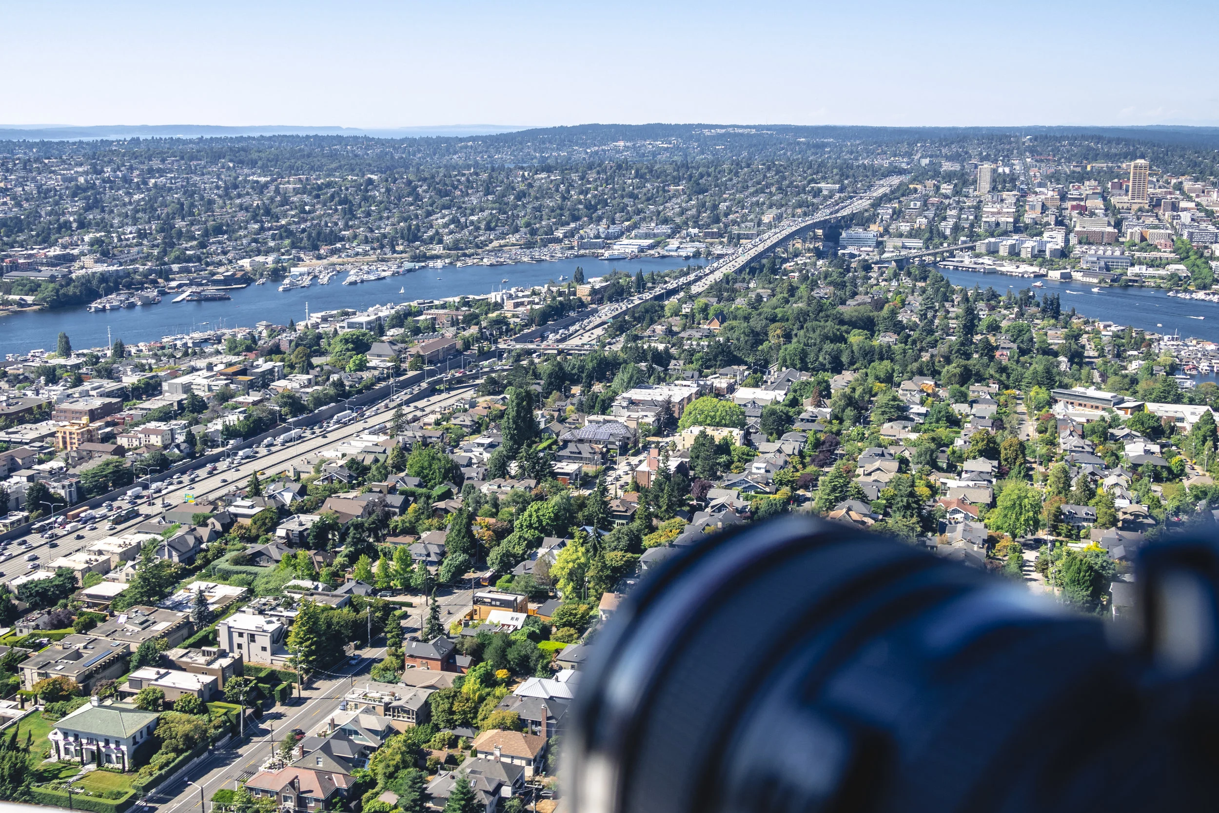 Aerial_Photography_Camera_Lens_Pointing_Out_Open_Helicopter_Door.jpg