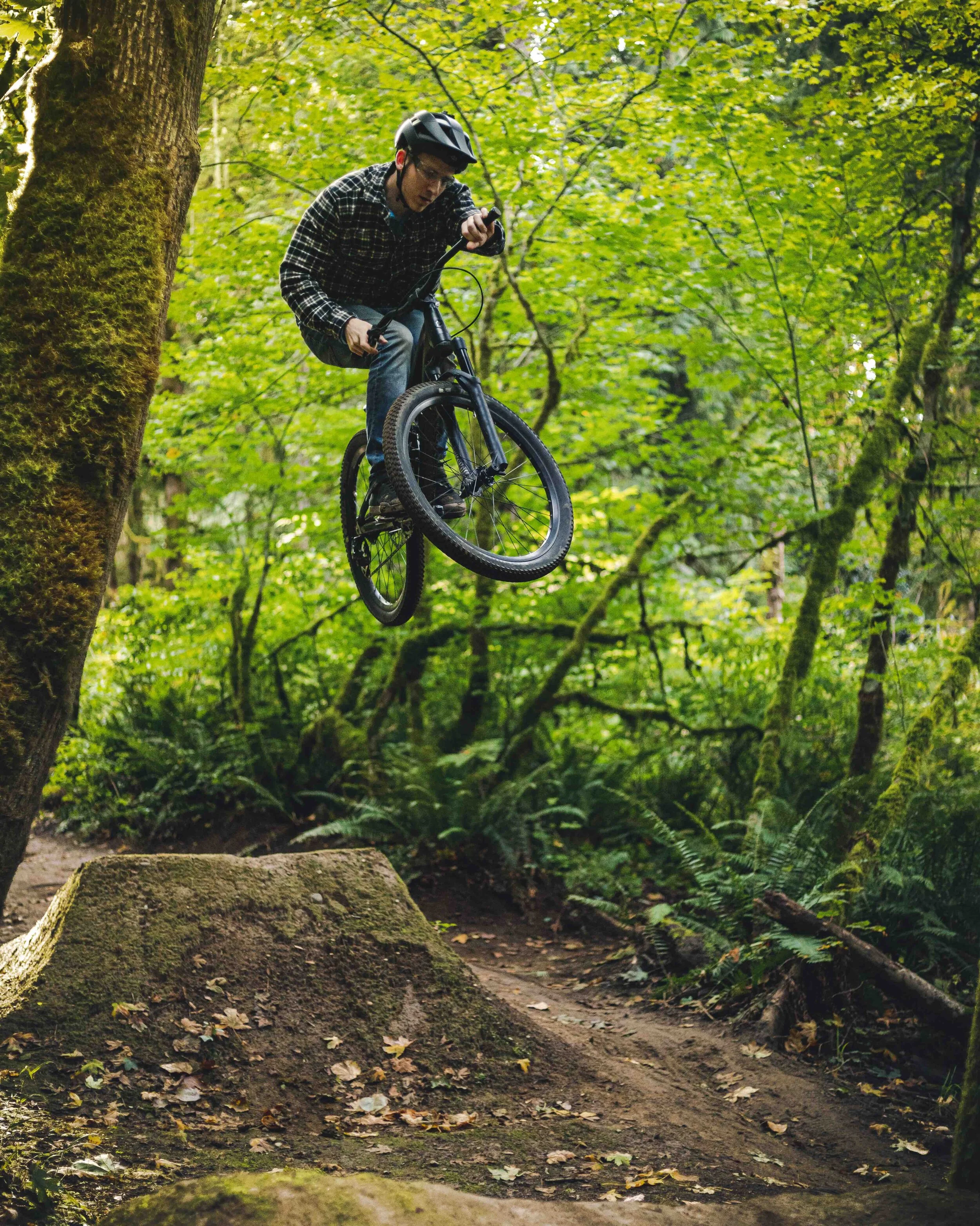 Man_Jumping_at_Duthie_Hill_Mountain_Bike_Park_in_Washington_State.jpeg