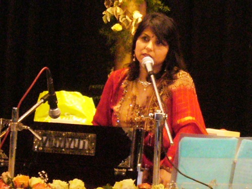 Swati Natekar singing and providing a melodious tune.JPG