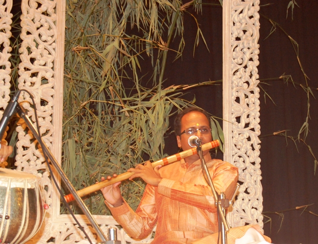 Himanshu Nanda charming the audience with the meldious flute tunes.JPG