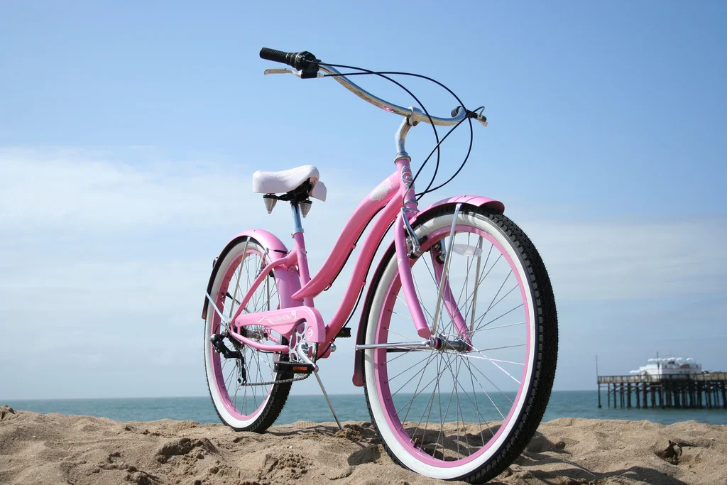 Beach cruisers, which have enjoyed renewed popularity in the last 20 years, typically have balloon tires, upright seating, and a single speed. They are generally very stable, relatively slow, and easy to ride, all factors that make for ideal cruising along beachfront boardwalks. (photo: Ehsan Taba)