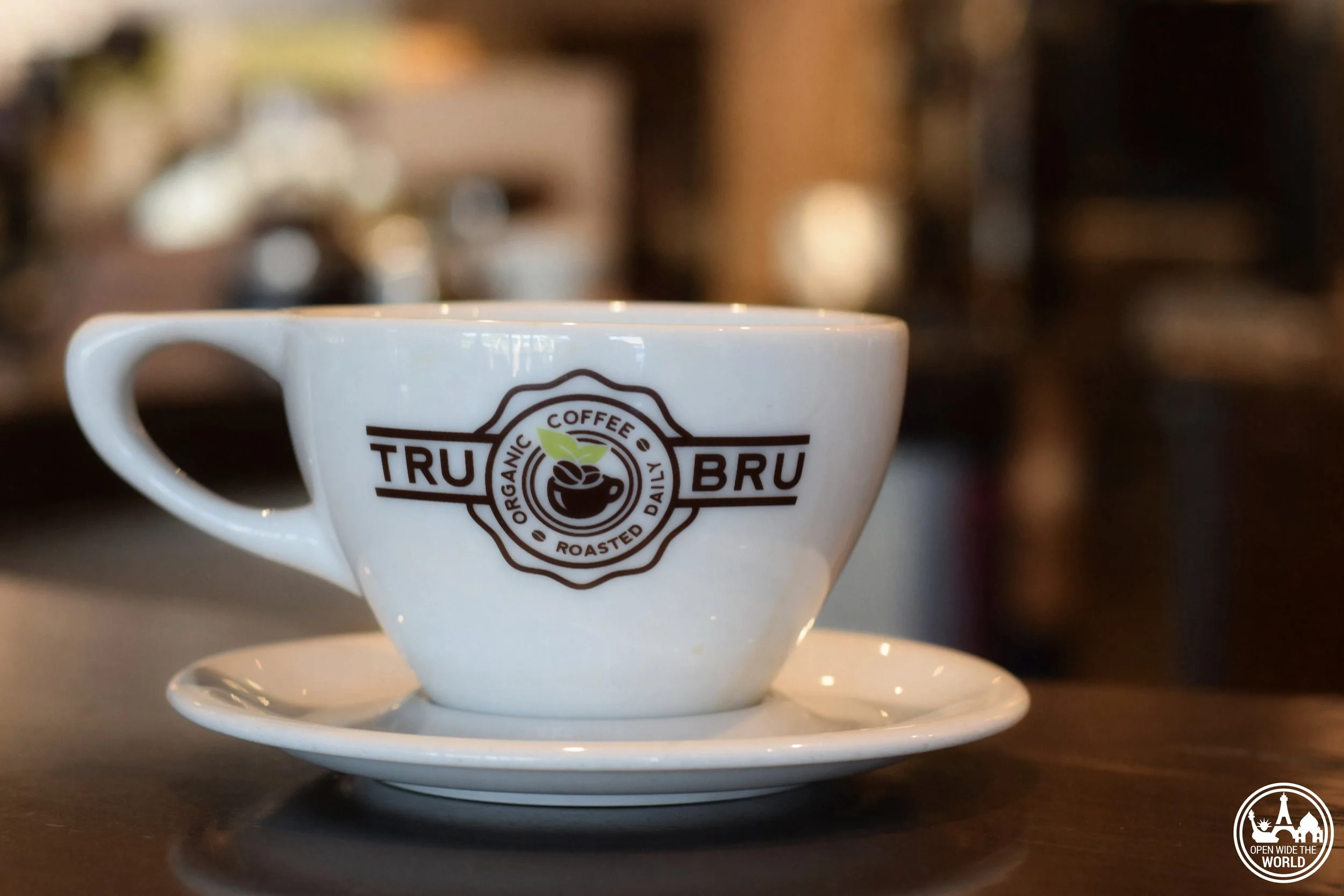 Third wave coffee arrived late, but hit hard in Orange County, California. Check out our five top picks for fair trade / direct trade coffee in this part of Southern California. Tru Bru Coffee, one of our picks for The Top 5 Fair Trade/Direct Trade Coffee Shops in Orange County, California - by Open Wide the World