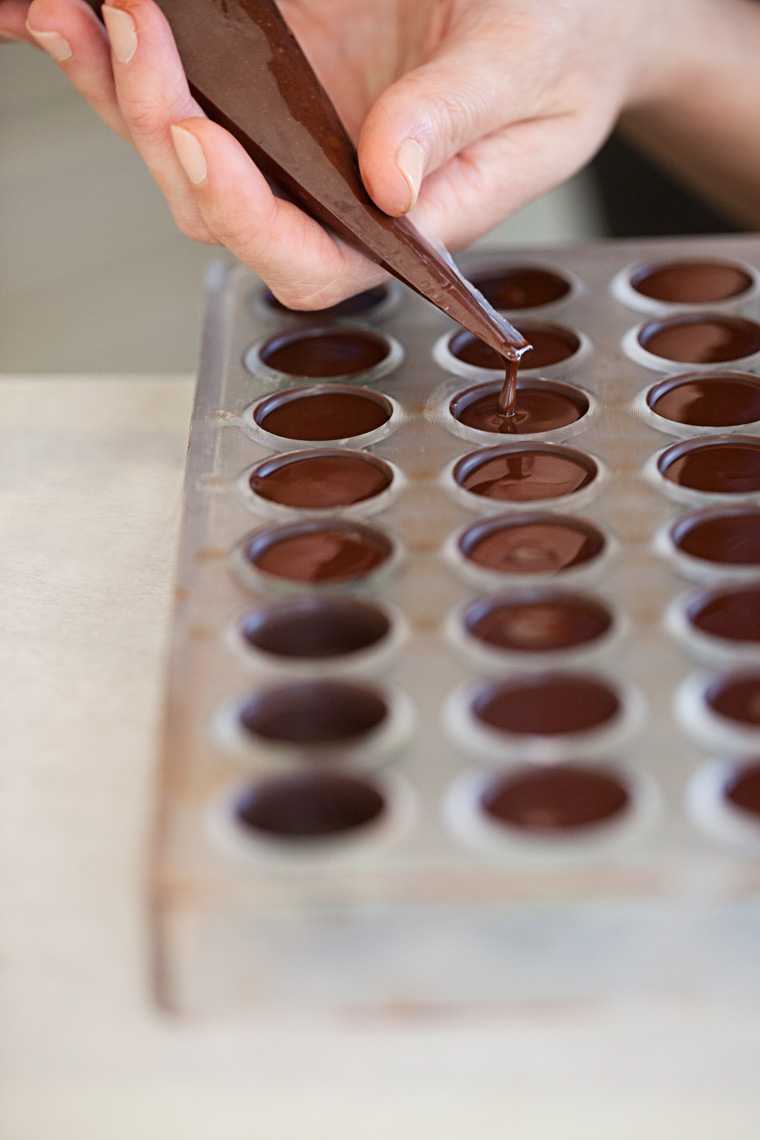 filling: piping ganache into molds
