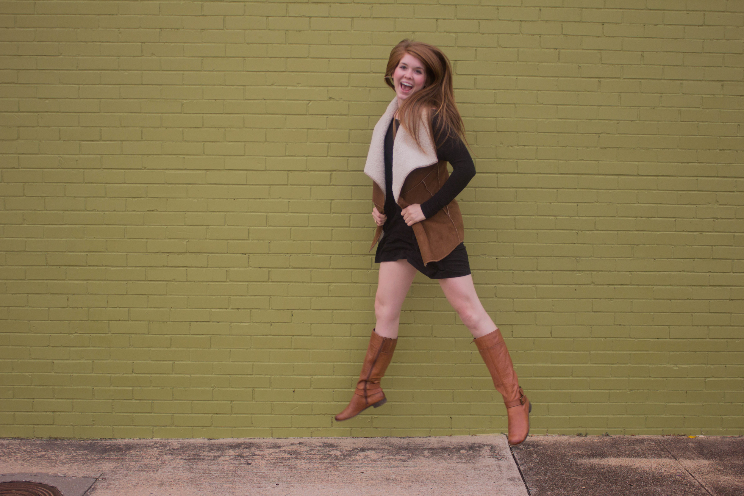 shearling vest, riding boots, piko tunic