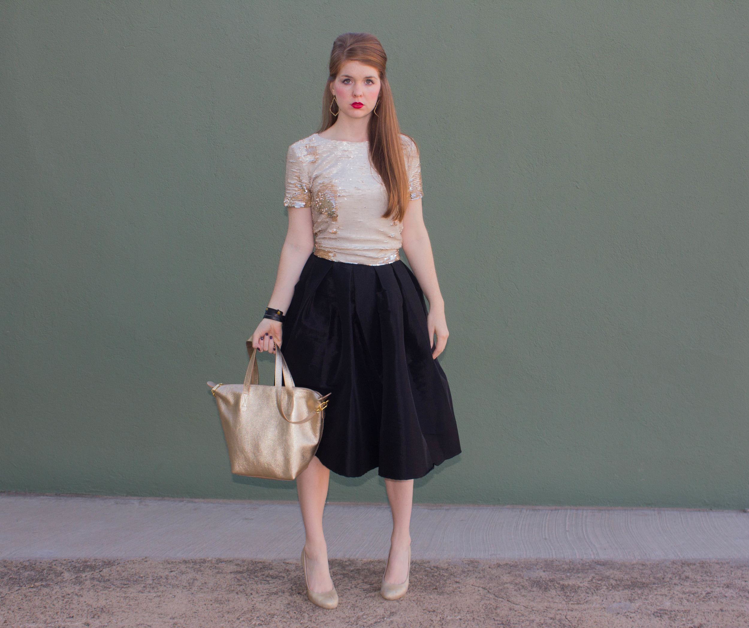 pleated black midi skirt, sequin top, cuyana carryall