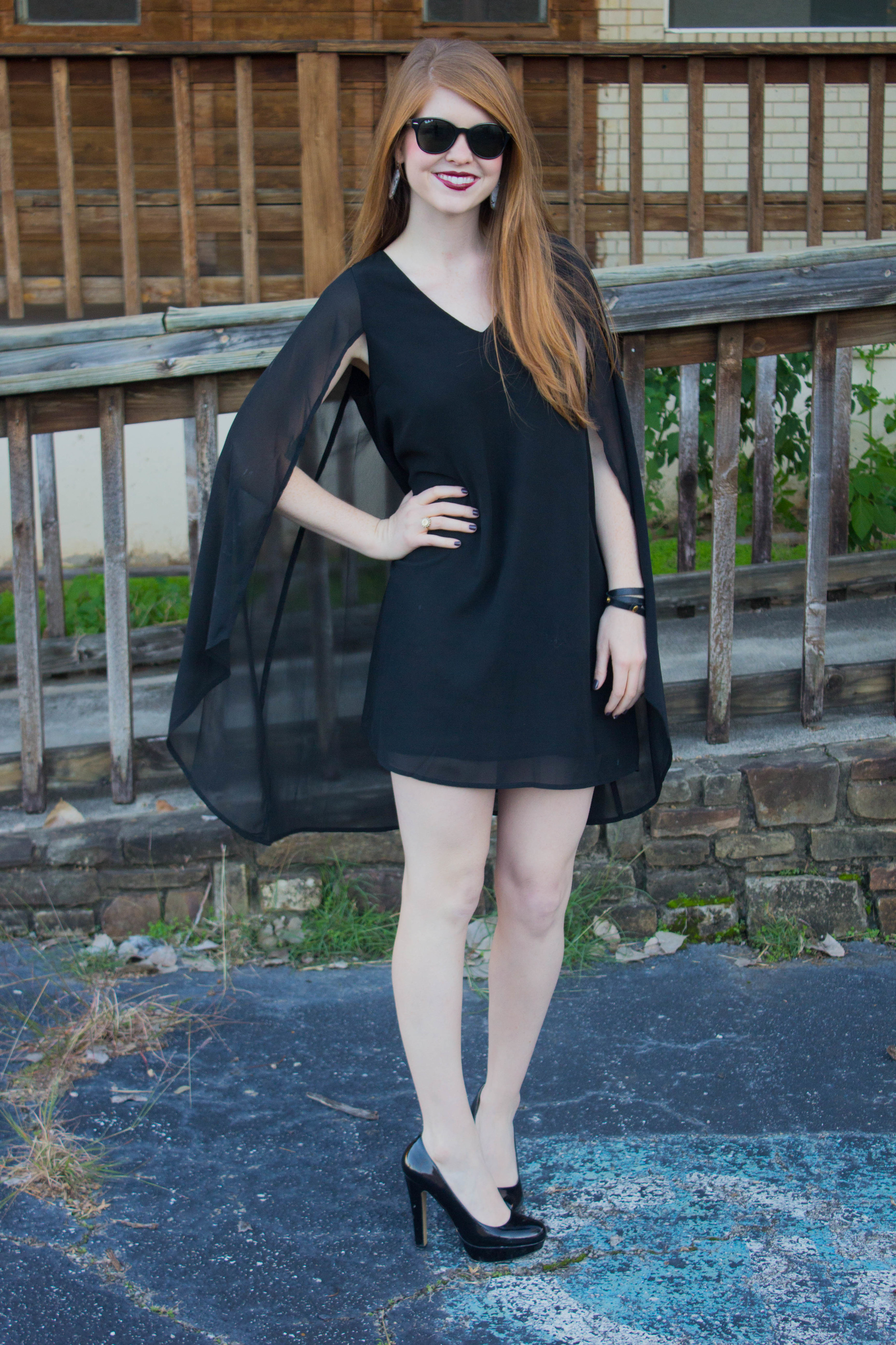 black cape dress, black patent heels, raybans