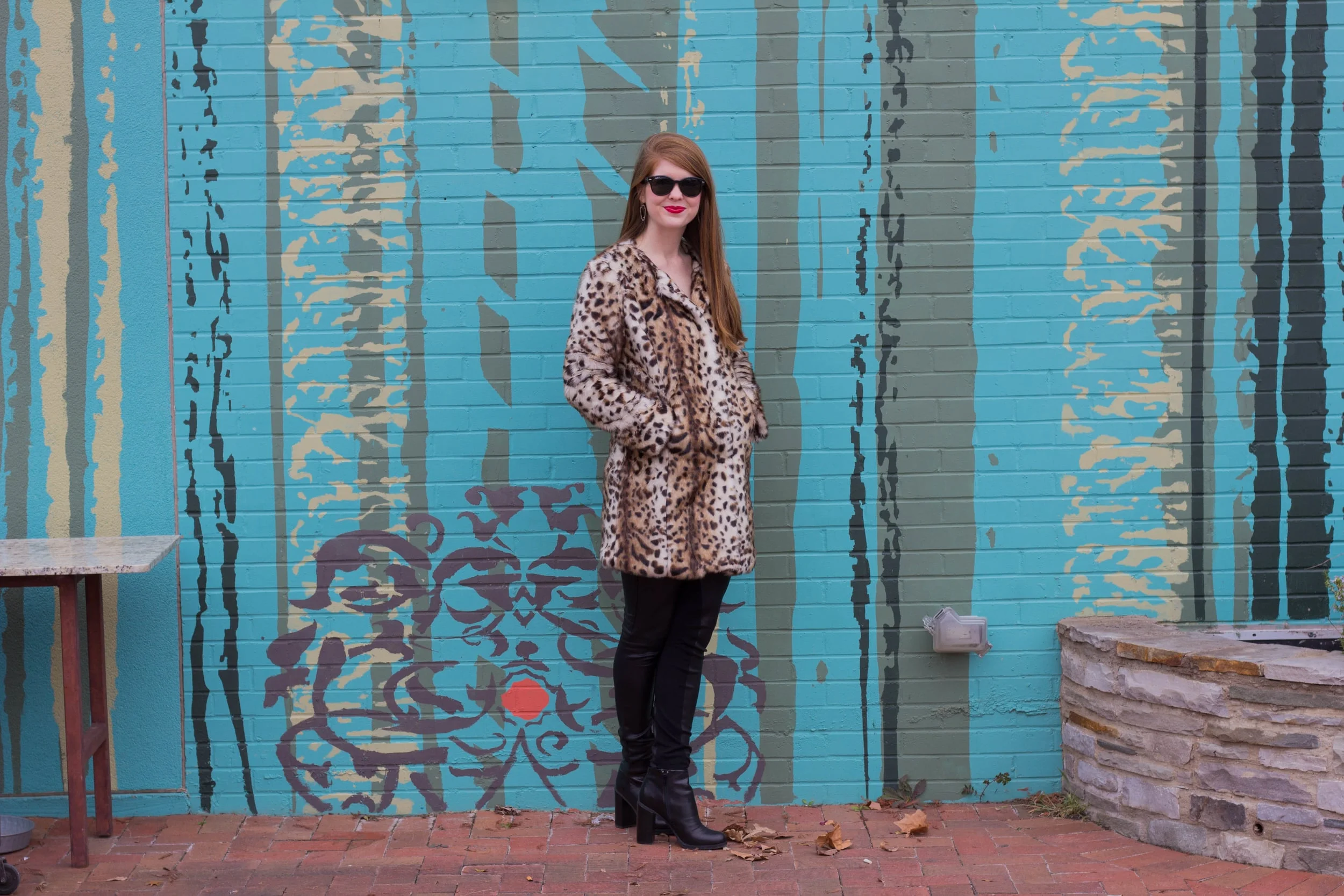 leopard coat, leather joggers, black raybans, red lip