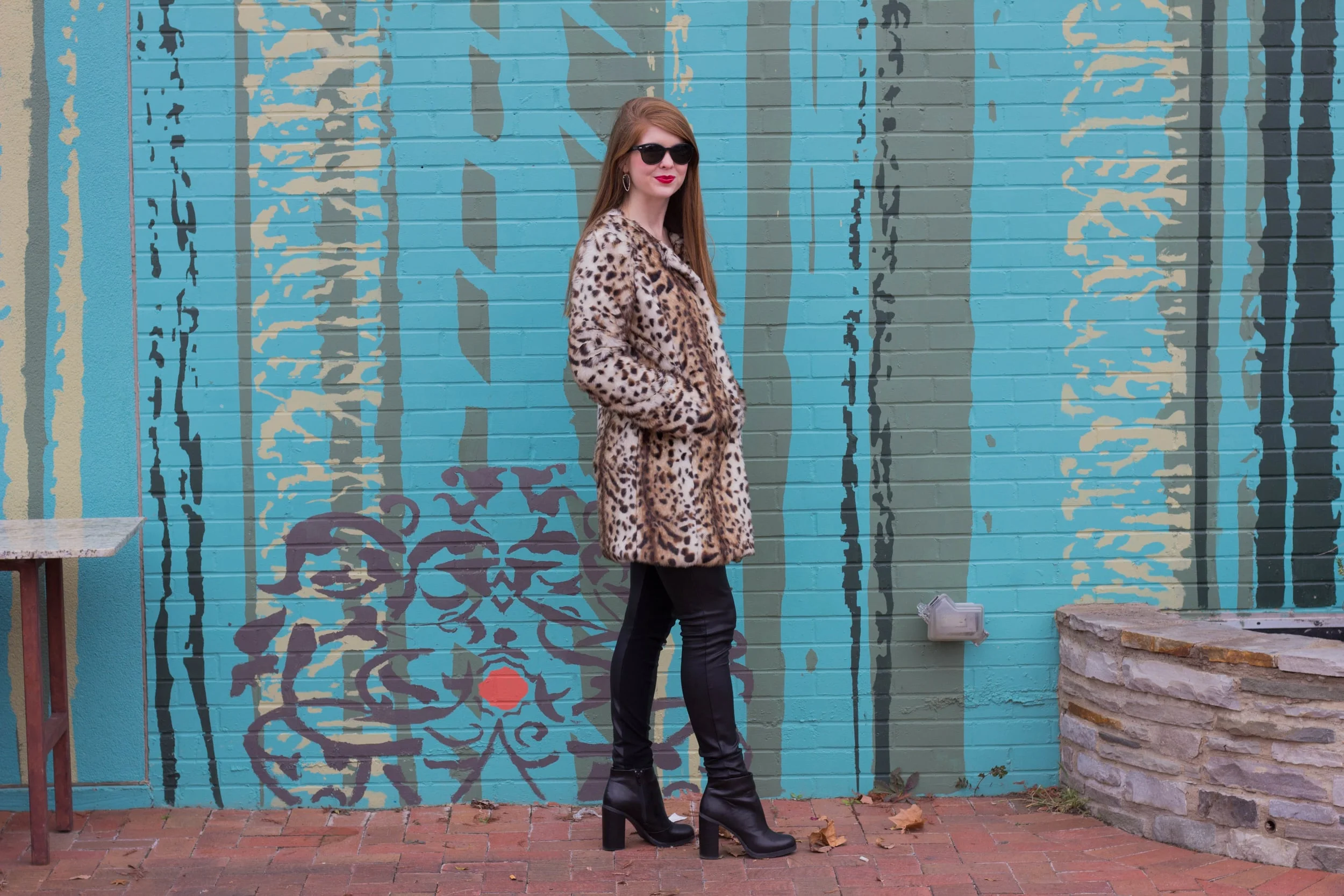 leopard coat, leather joggers, black raybans, red lip