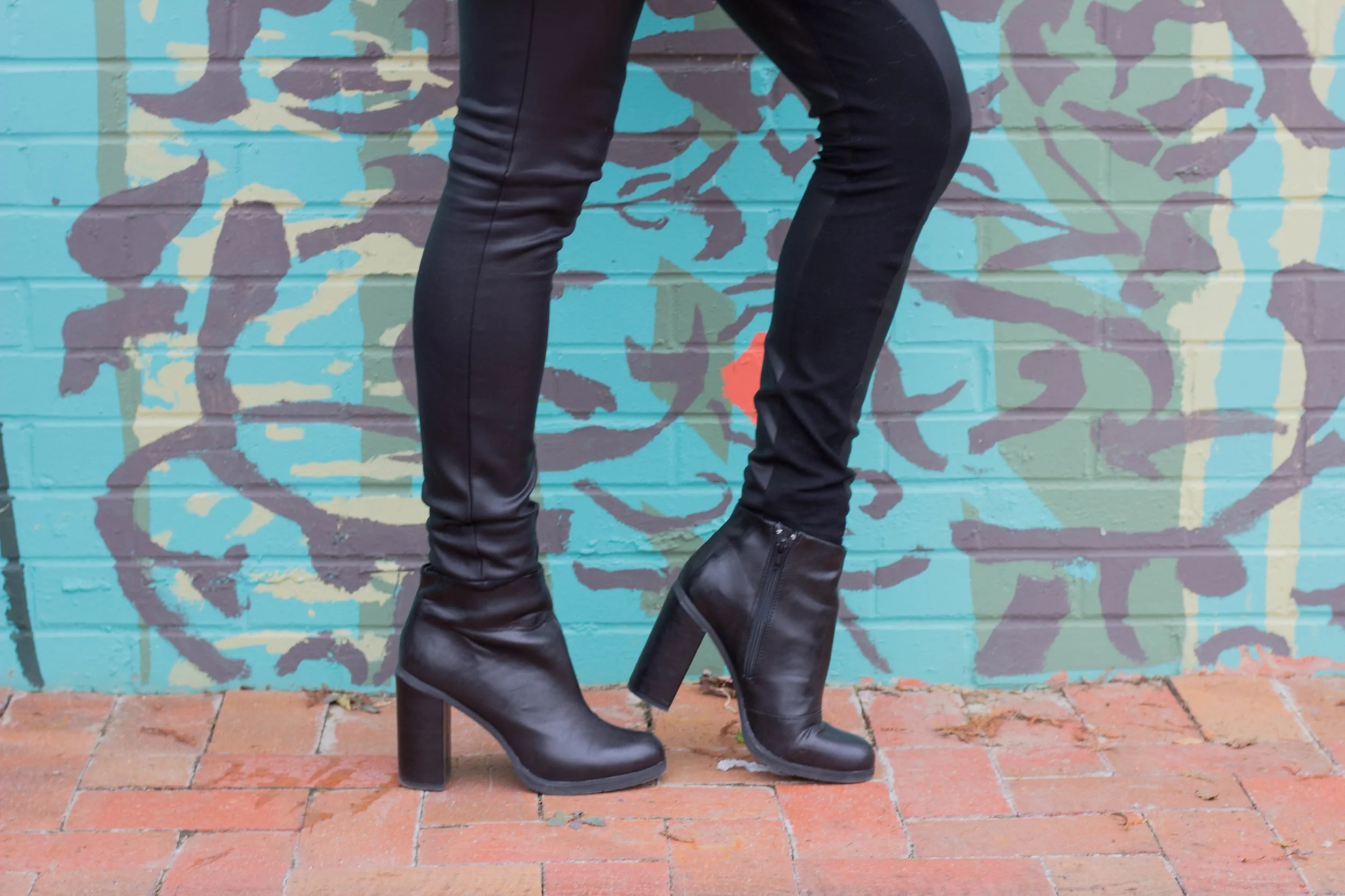 leopard coat, leather joggers, black raybans, red lip