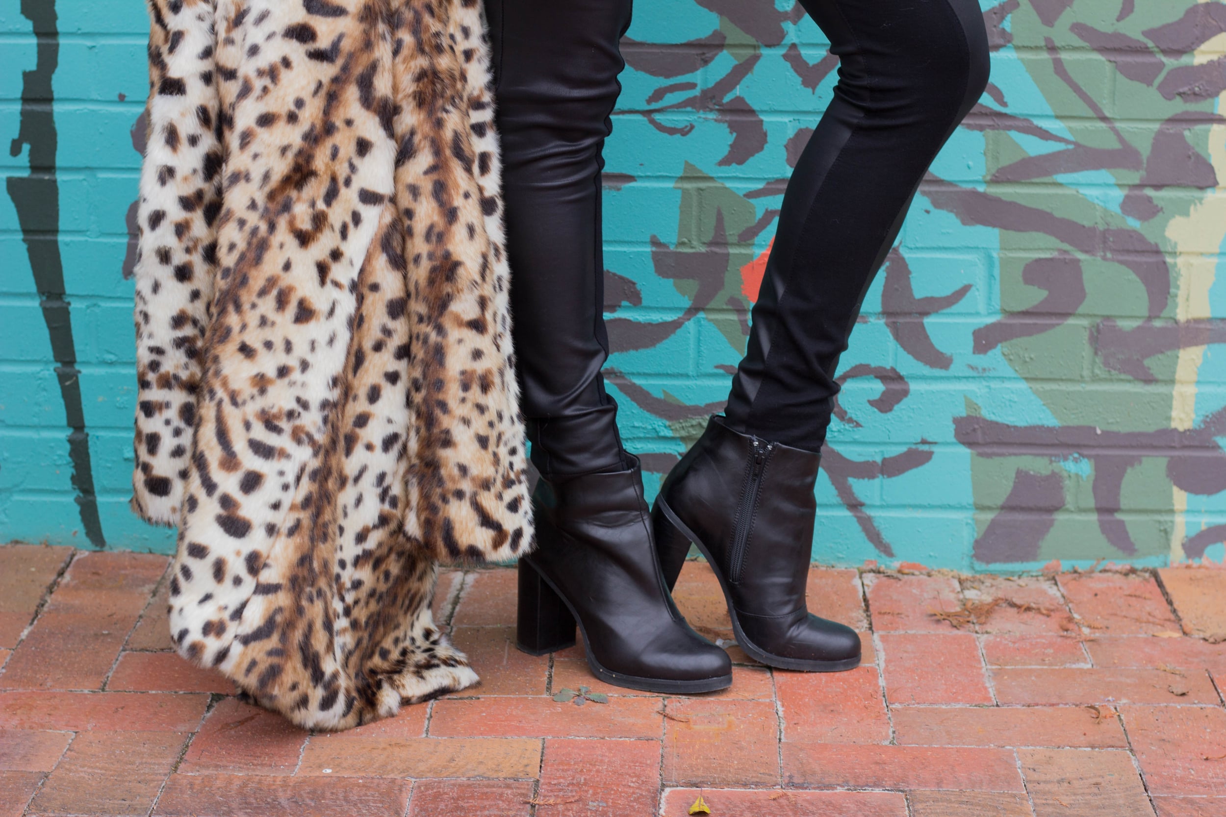 leopard coat, leather tights, black raybans, red lip