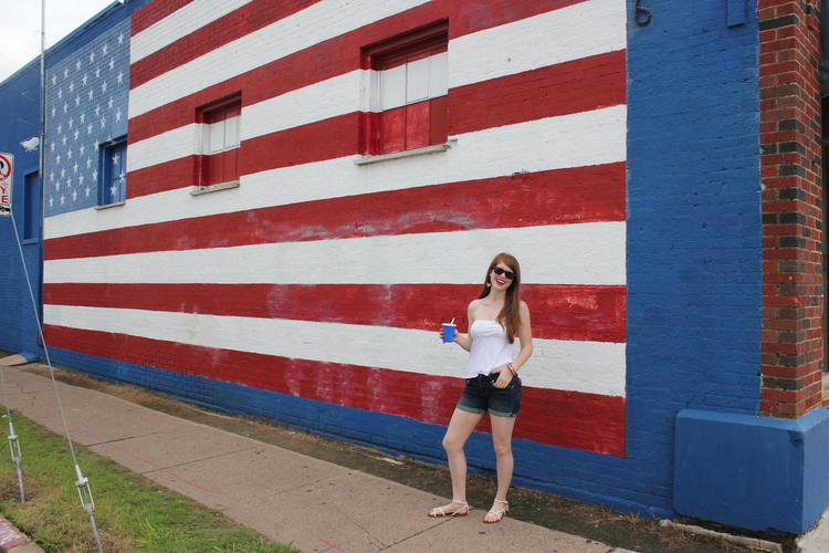 American flag mural, deep ellum, Fourth of July, white strapless top, denim shorts