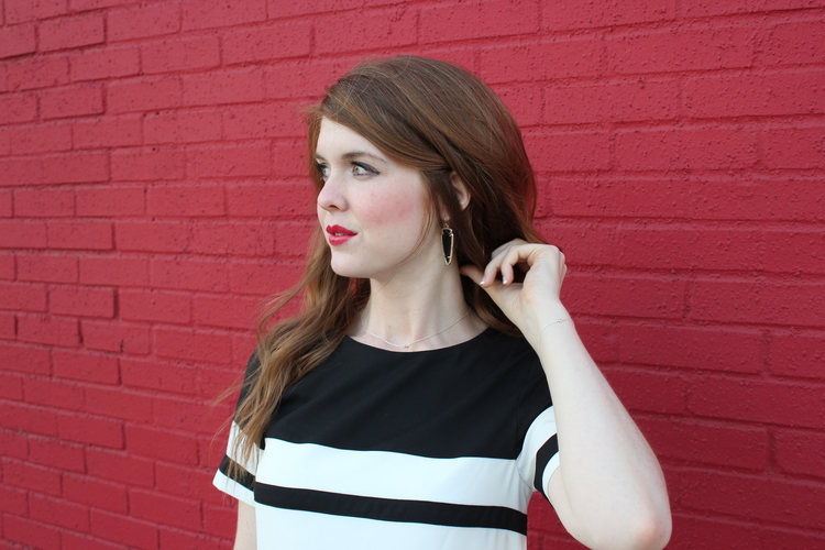Red lips, Dallas design district, Kendra Scott skylar earrings, red hot background, striped shift dress