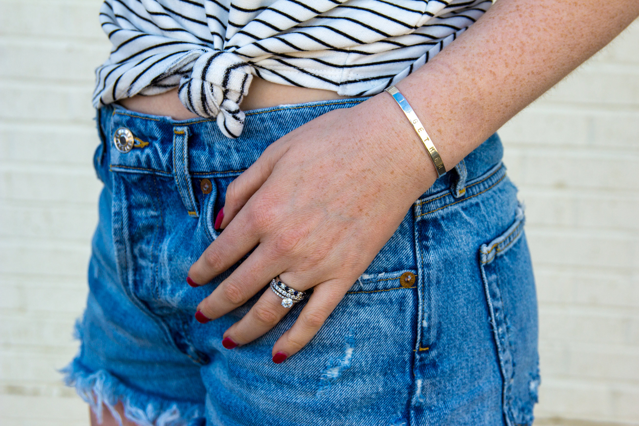 longer denim shorts, agolde parker denim shorts, daily ritual supersoft terry tee, ray-ban erik sunglasses, white slides sandals, 31 bits together bracelet, thirt one bits, denim shorts that are longer than one teaspoon, cut-off jean shorts that are…