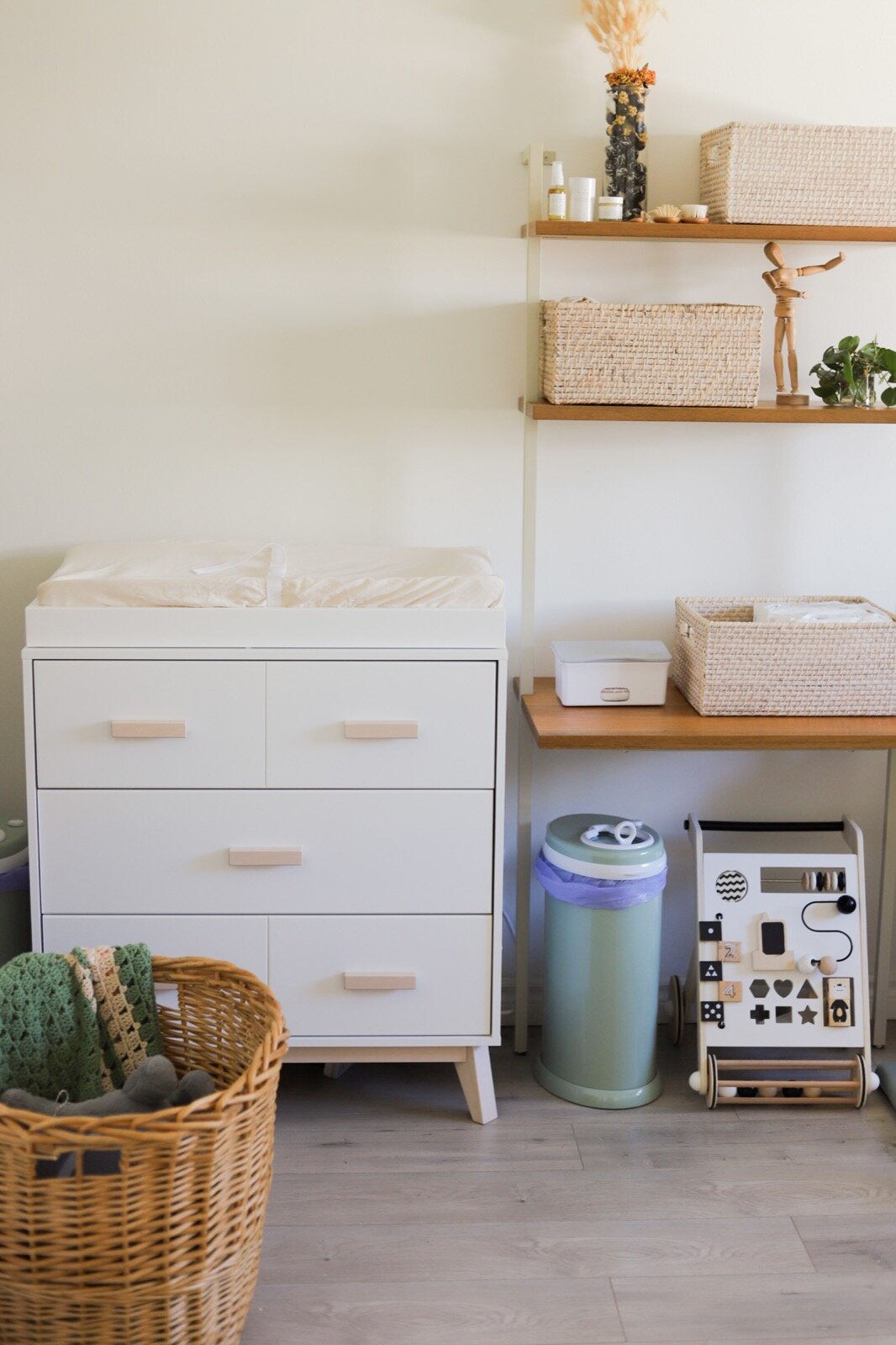 boy girl twin nursery reveal, green neutrals wood baby nursery reveal inspiration inspo, small la apartment nursery, di di twins, primally pure baby kit, cute storage baskets, babyletto changing table, ubbi diaper pail, wooden walker toy, colgate ch…