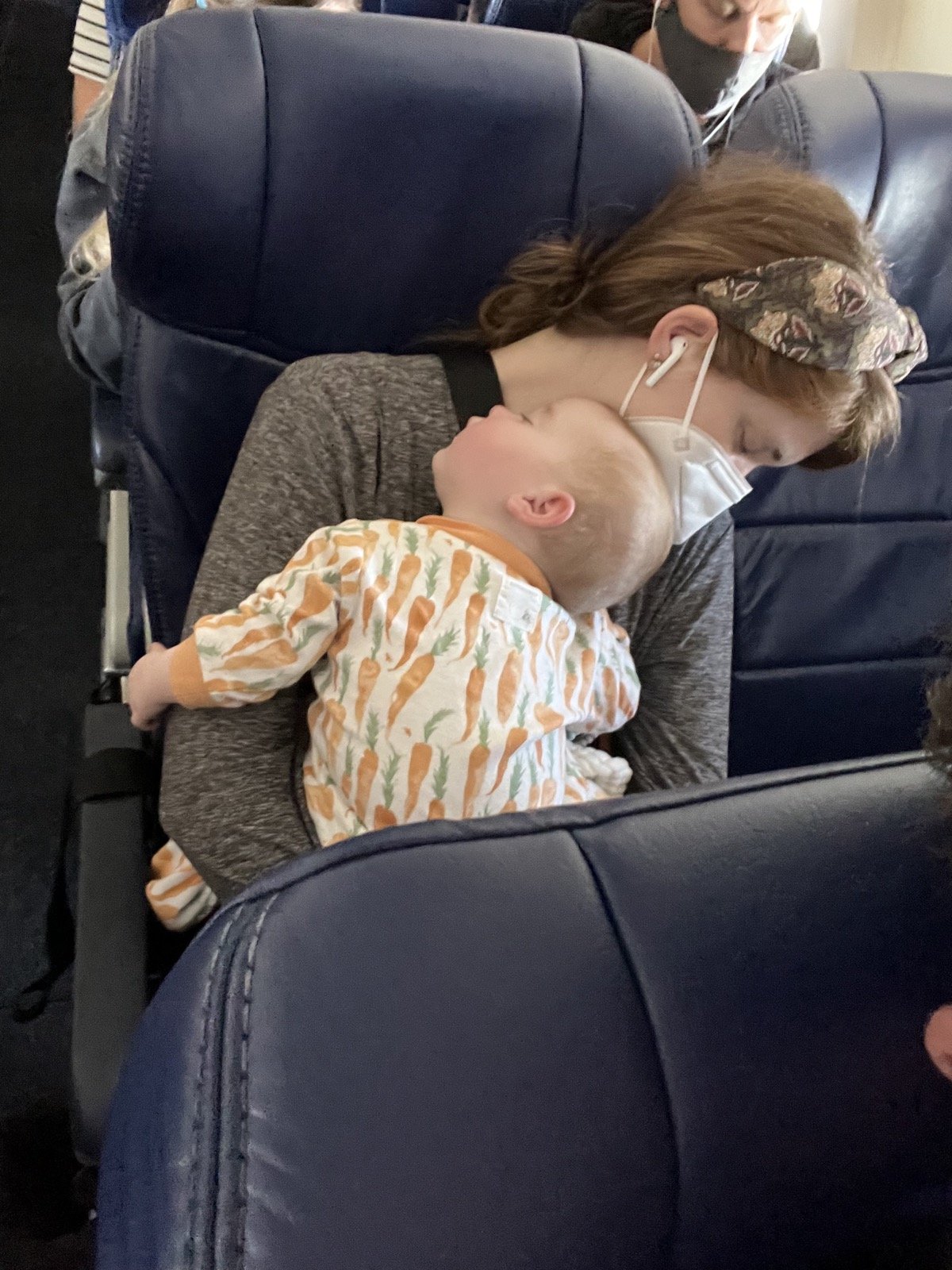 how young can you fly with babies, tips for flying with infant twins babies, lments of style airplane baby tips,