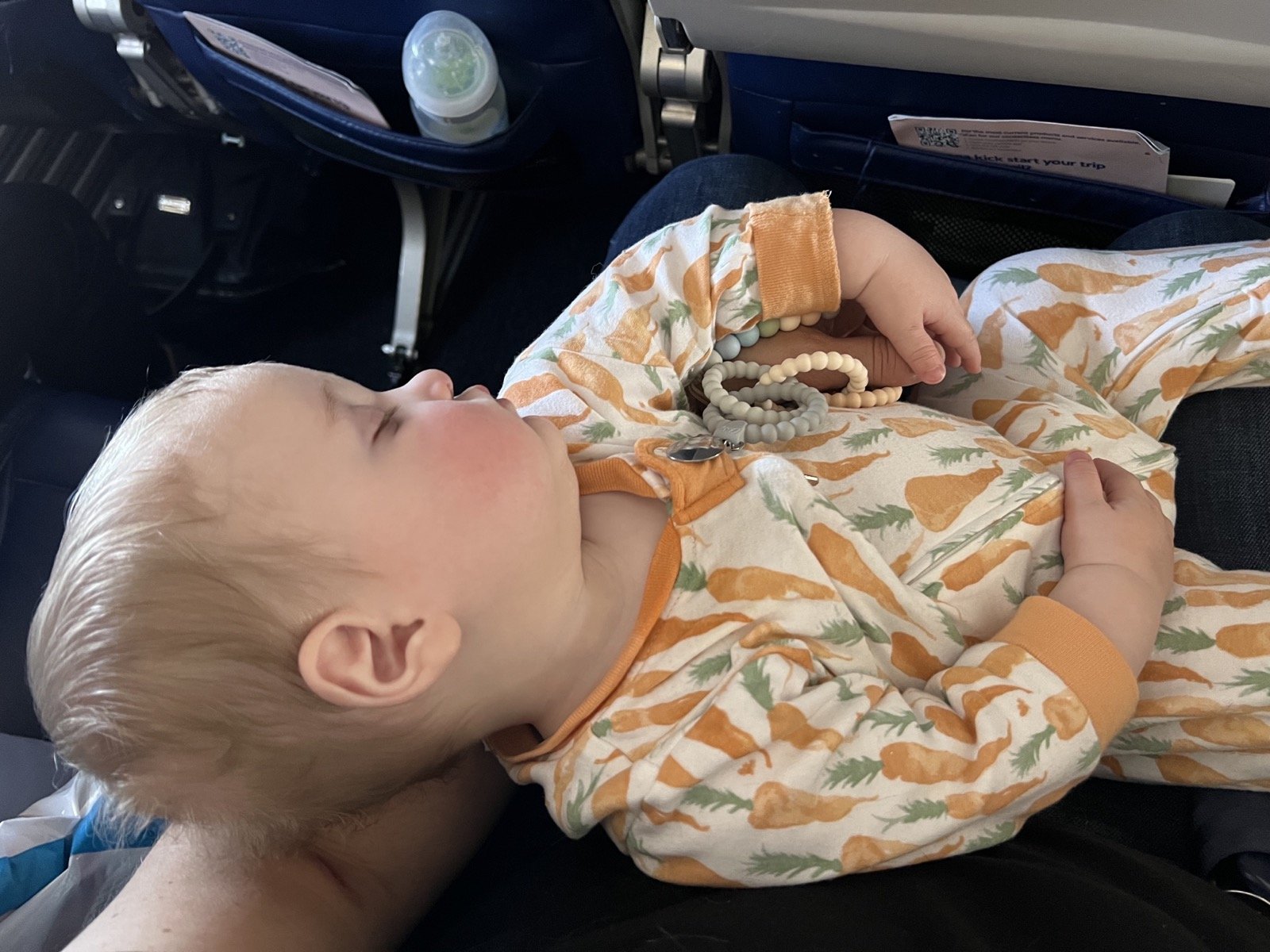 how young can you fly with babies, tips for flying with infant twins babies, lments of style airplane baby tips, easiest for baby to wear on a plane