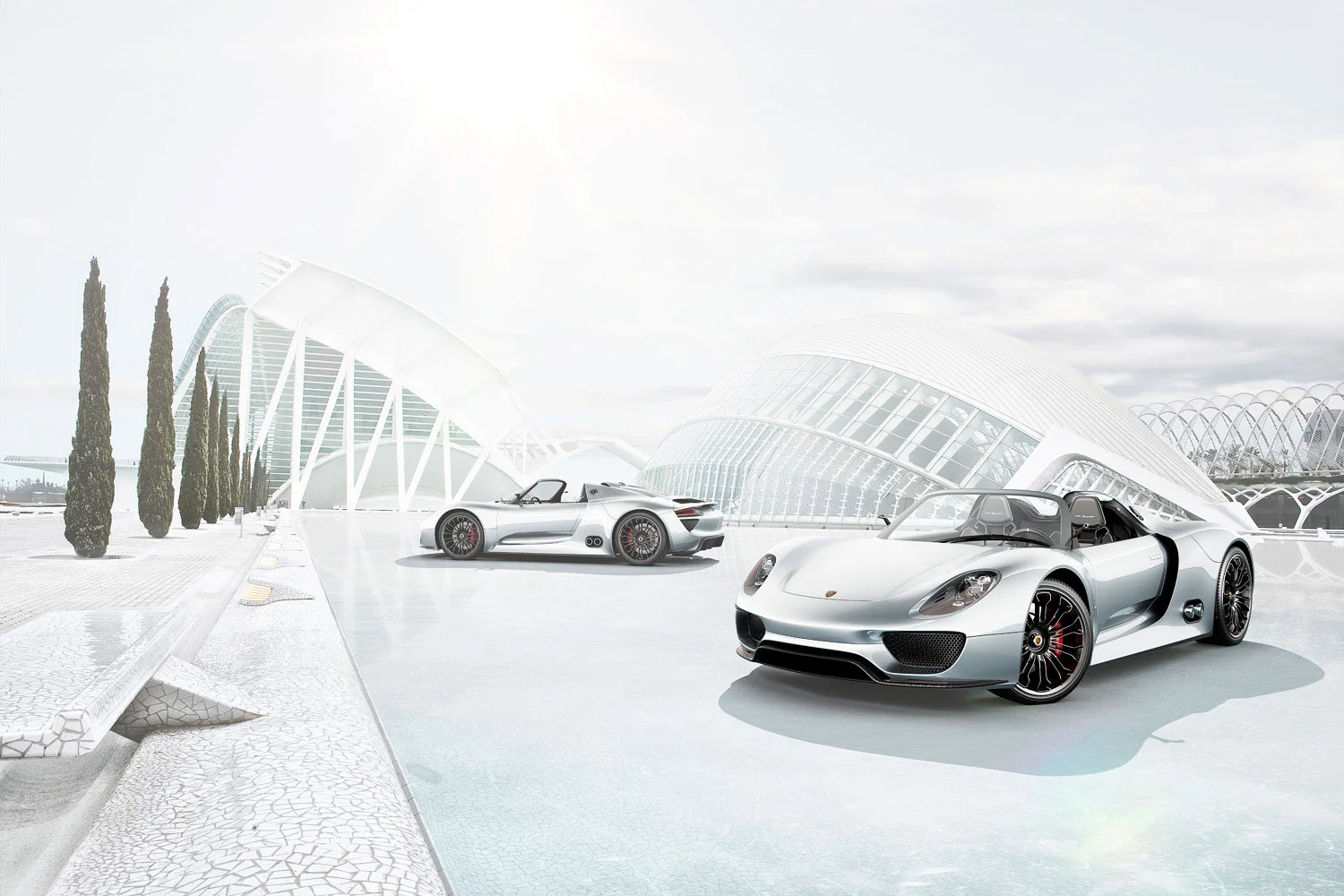 Two Porsche Spyders in front of the City of Arts and Sciences in Valencia Spain