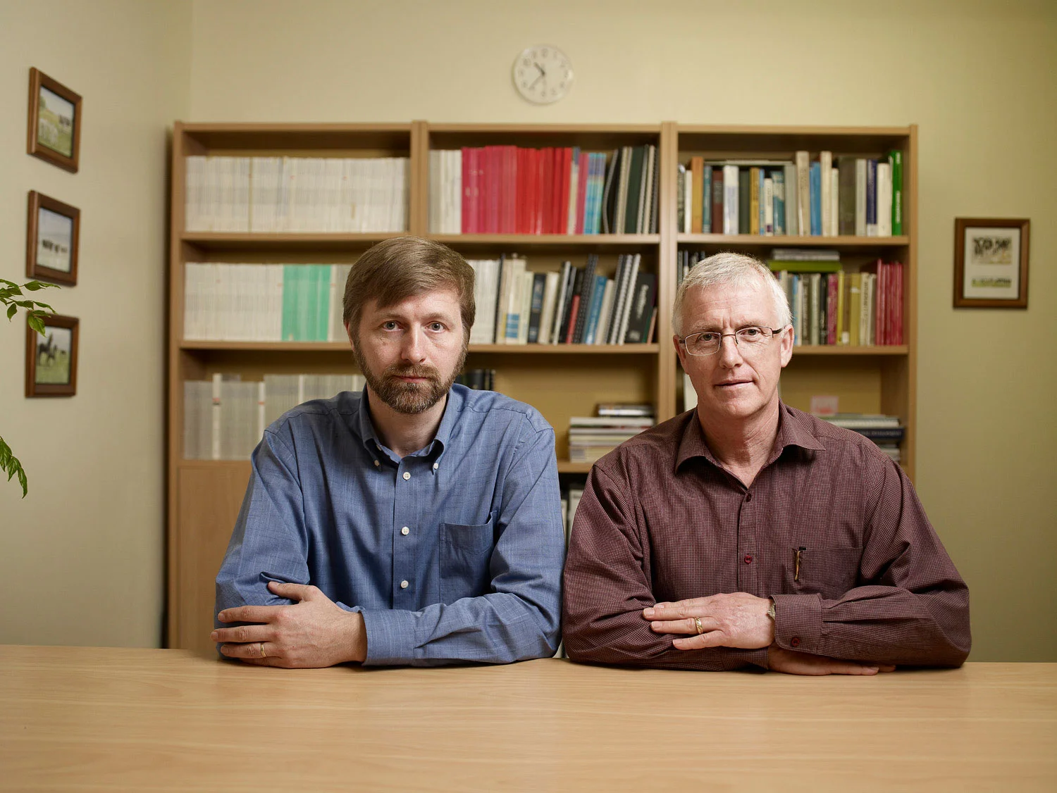 Two consultants sitting at a desk in an office