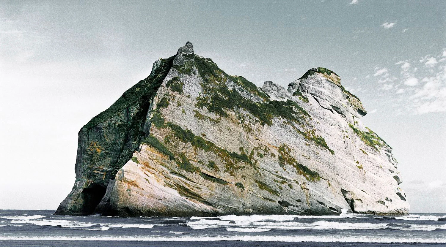 Landscape image of Archway Islands with rolling waves