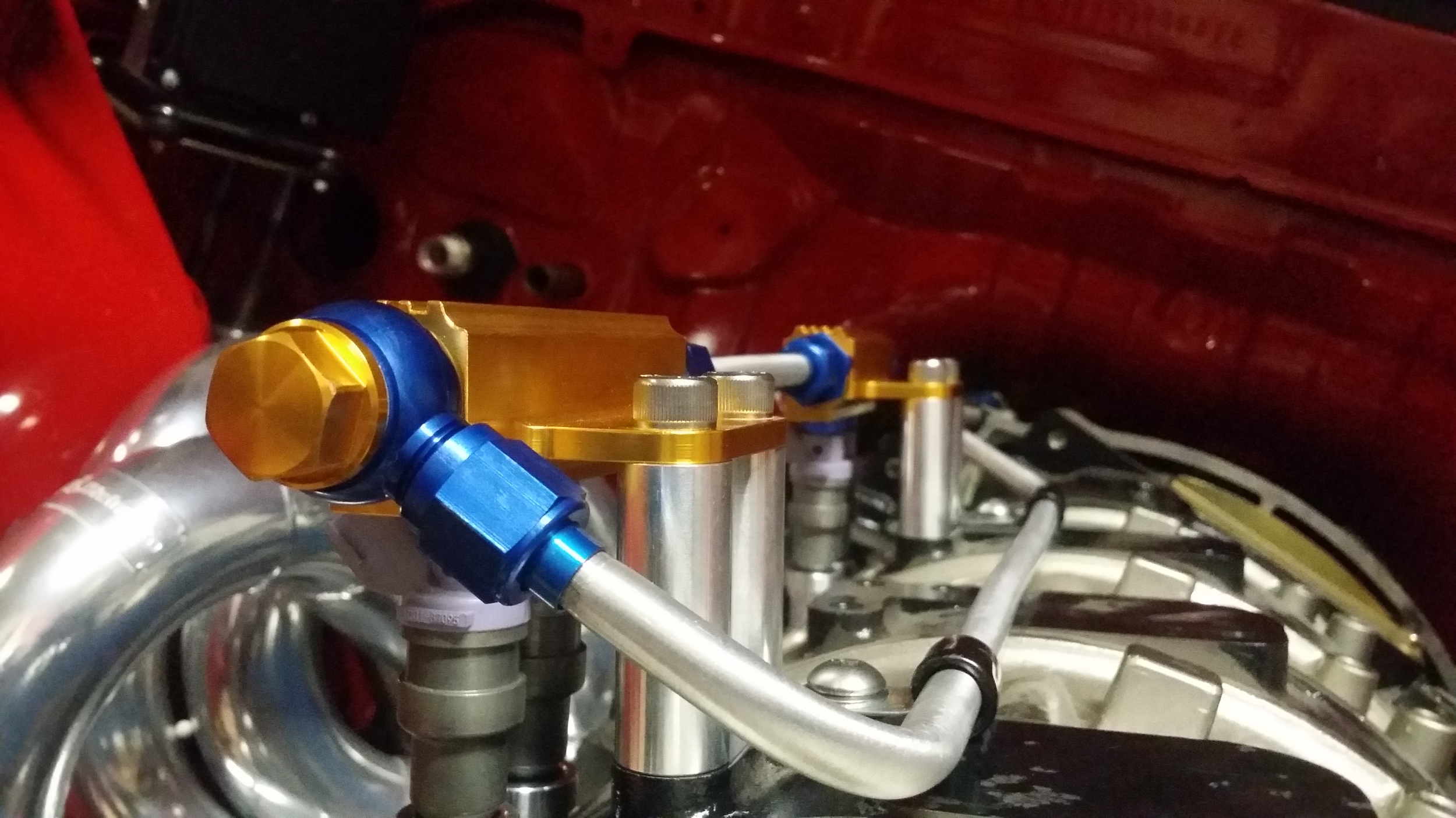  Banjo inlet fed by smooth bend aluminum fuel line.&nbsp; 
