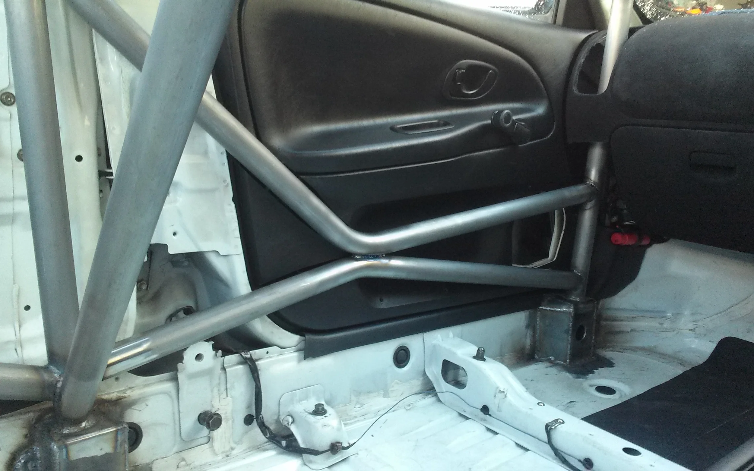 Evo_6_VI_RS_TME_Global_Time_Attack_Roll_Cage_How_To_The_Fabricator_Merrill_Performance_(1)13[1].jpg