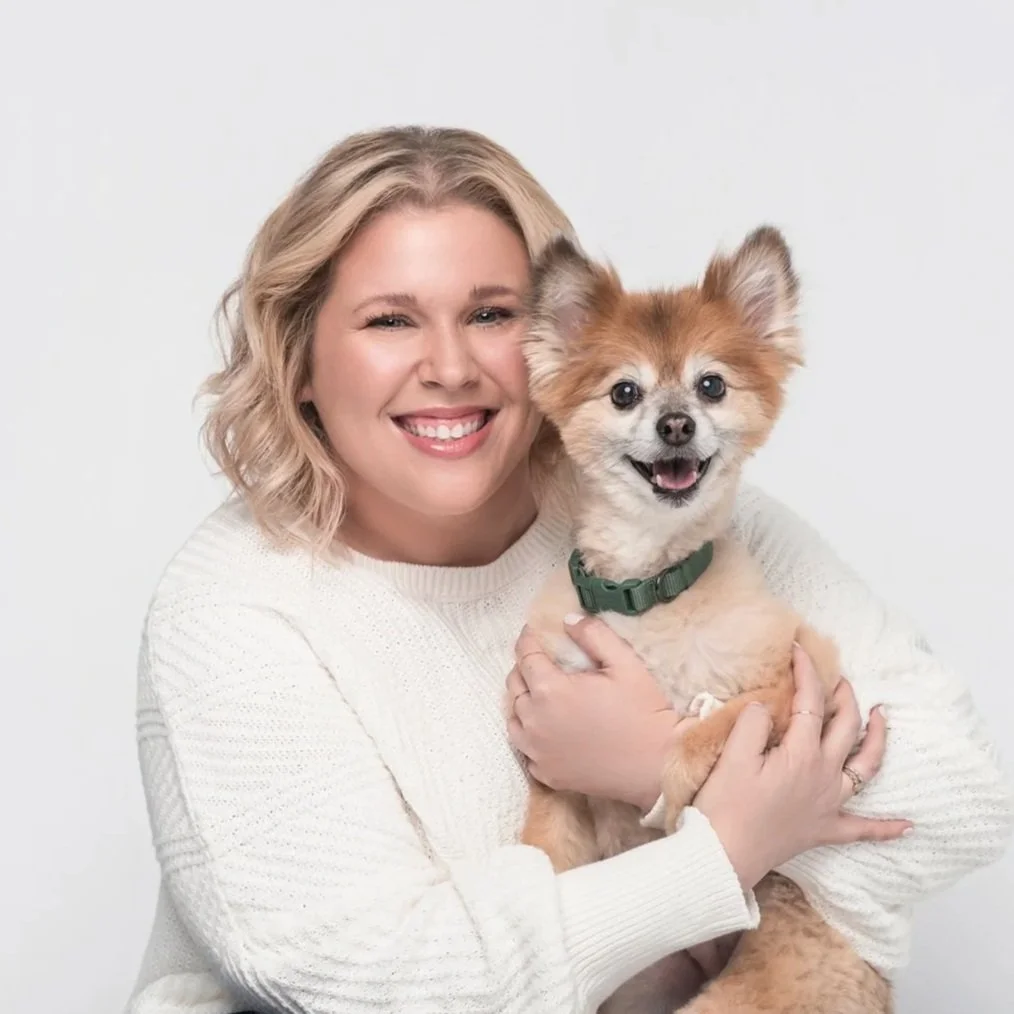 dog and people studio portrait woman with small dog smiling