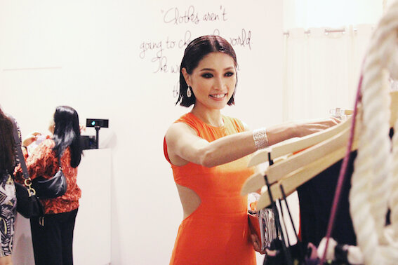 Amber Chia sifts through new arrivals at the Love, Bonito store in Publika.JPG