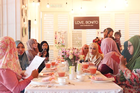28th April 2015 - Guest enjoy a high tea spread between styling presentations by Shear Rasol, Raja Nadia Sabrina and Maria Elena.png