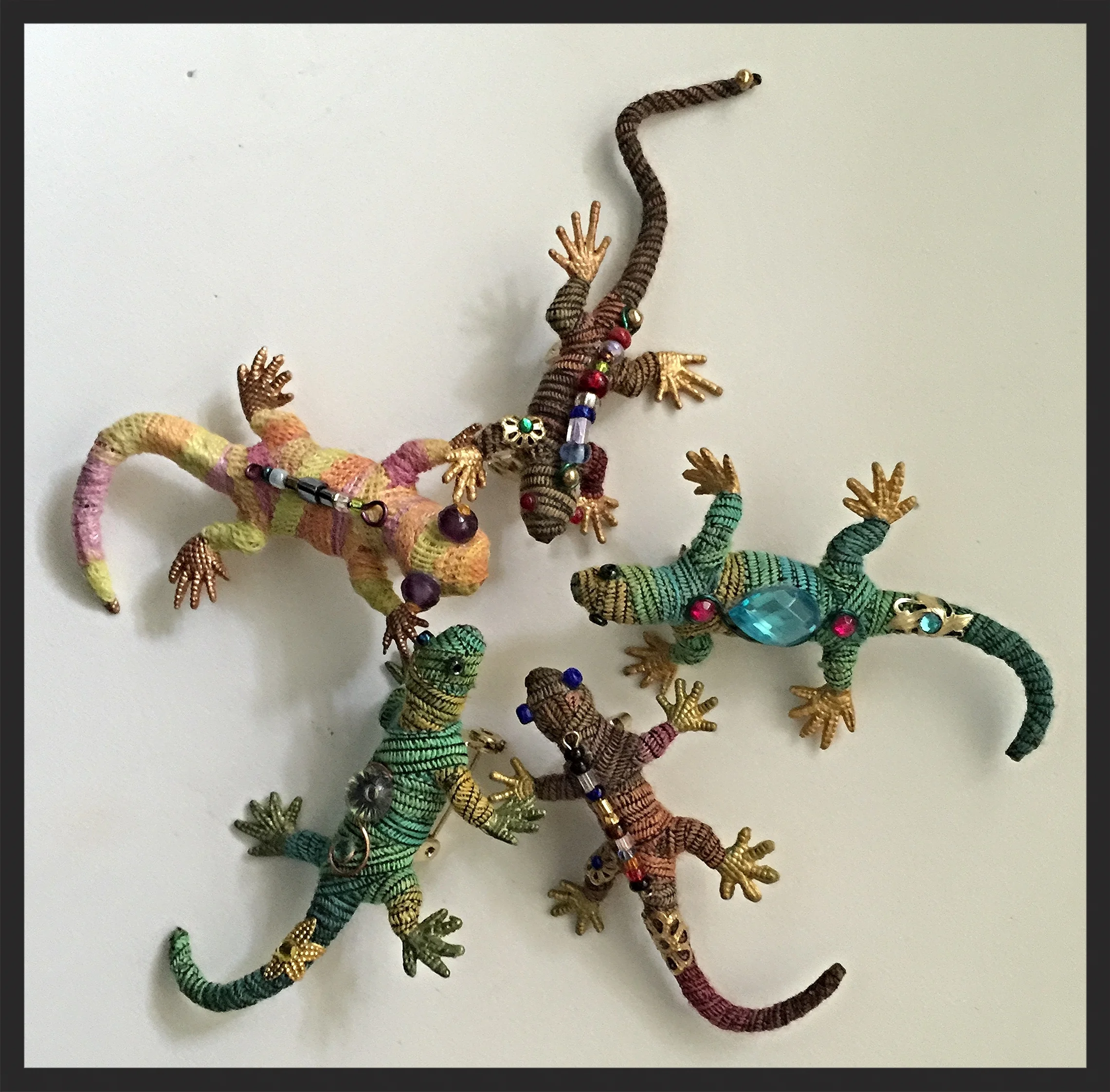  A selection of my little guys.&nbsp; They are about 2 inches long.&nbsp; Started making these because I wanted one to put on my Desert Botanical Garden lanyard and they just fit...also sold some to fellow volunteers.... 