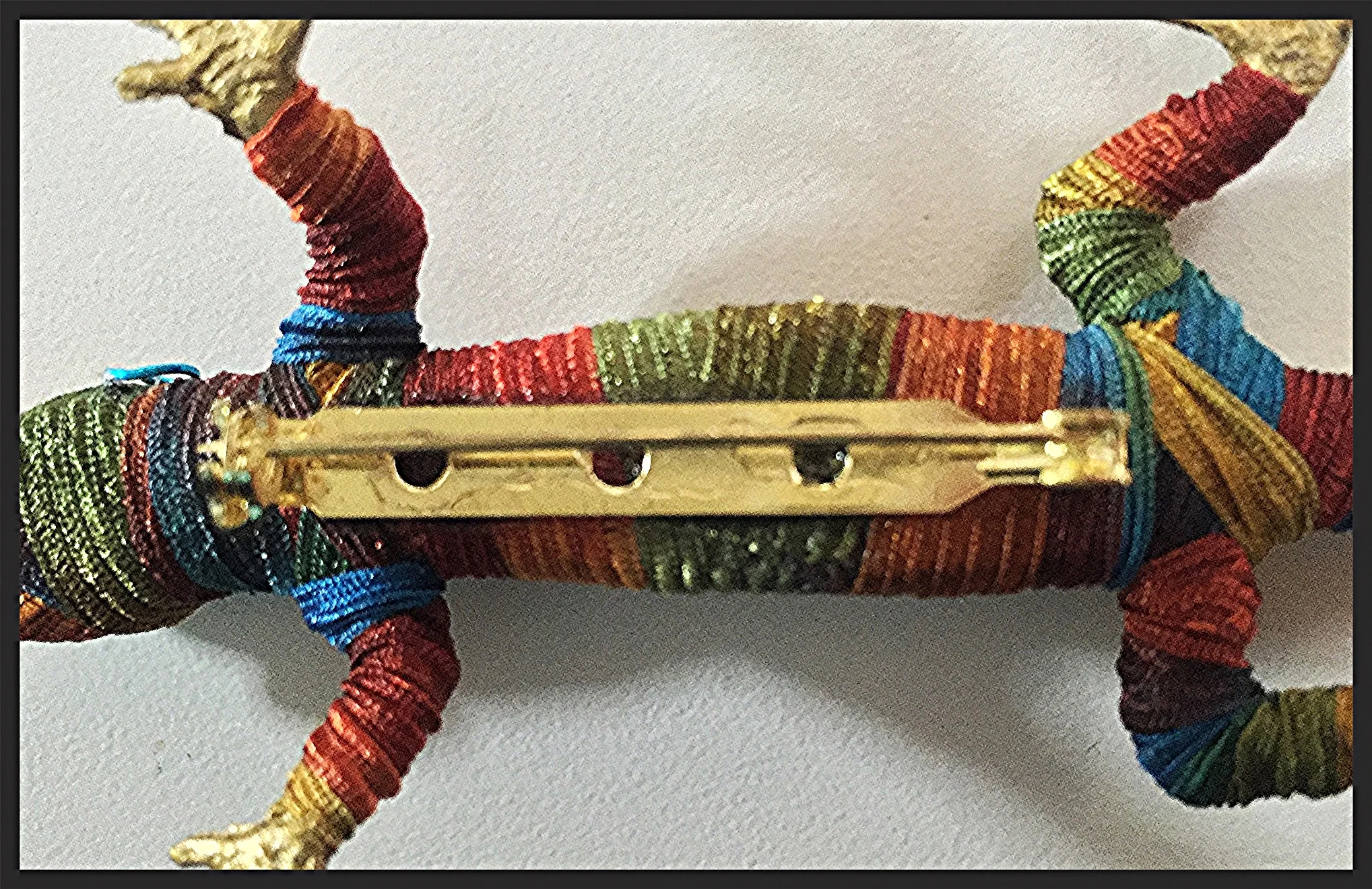  A total of 4 different types of glue is used to make each piece.&nbsp; 2 glues are used to attach pin back to make them extra secure.&nbsp; 