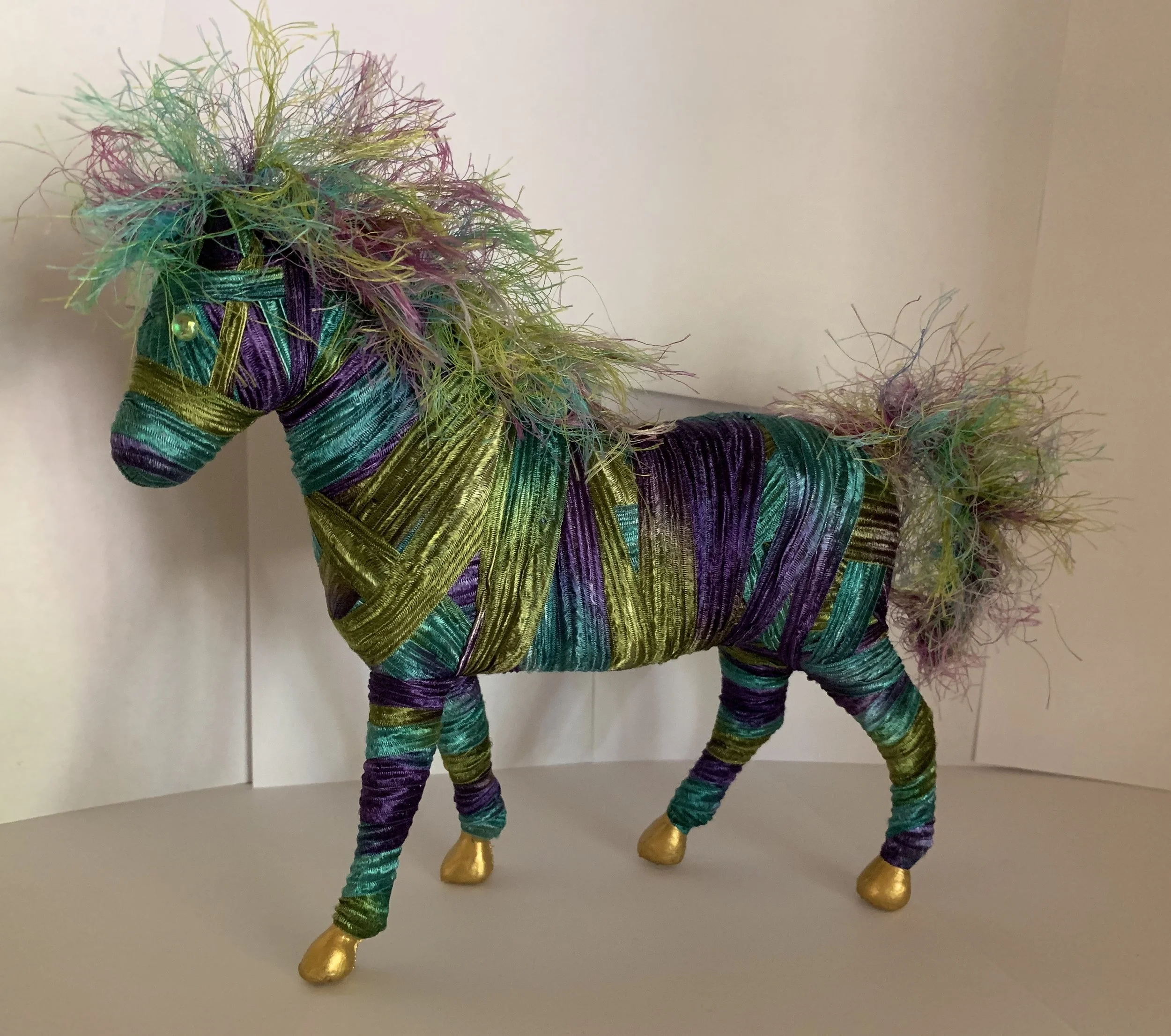  Here is a whimsical horse I made for the Let’s Imagine gift shop in downtown Scottsdale.  The next picture is also one.  They stand about 10” tall.  I haven’t brought them to the store as yet, but trying to make a few more large critters for her dis