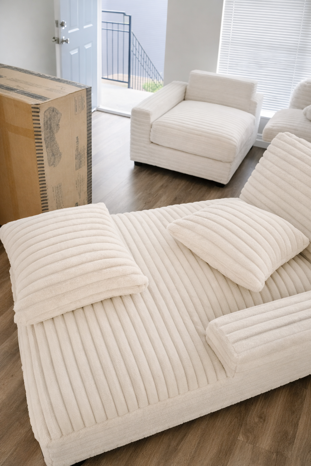 courduroy chaise on modular sectional.png