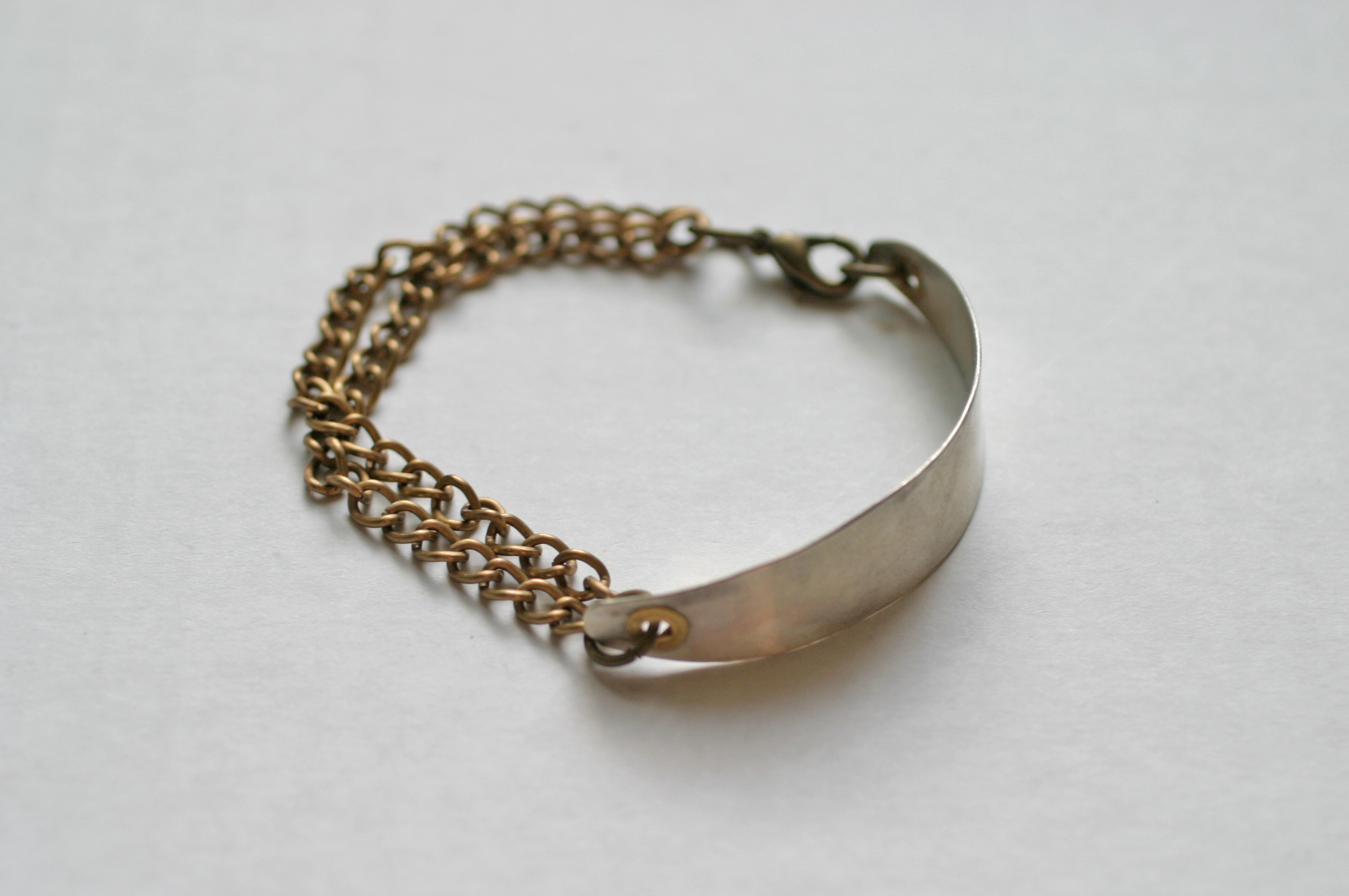 Elizabeth Baird Architecture-Jewelery-silver and brass chain bracelet.jpg
