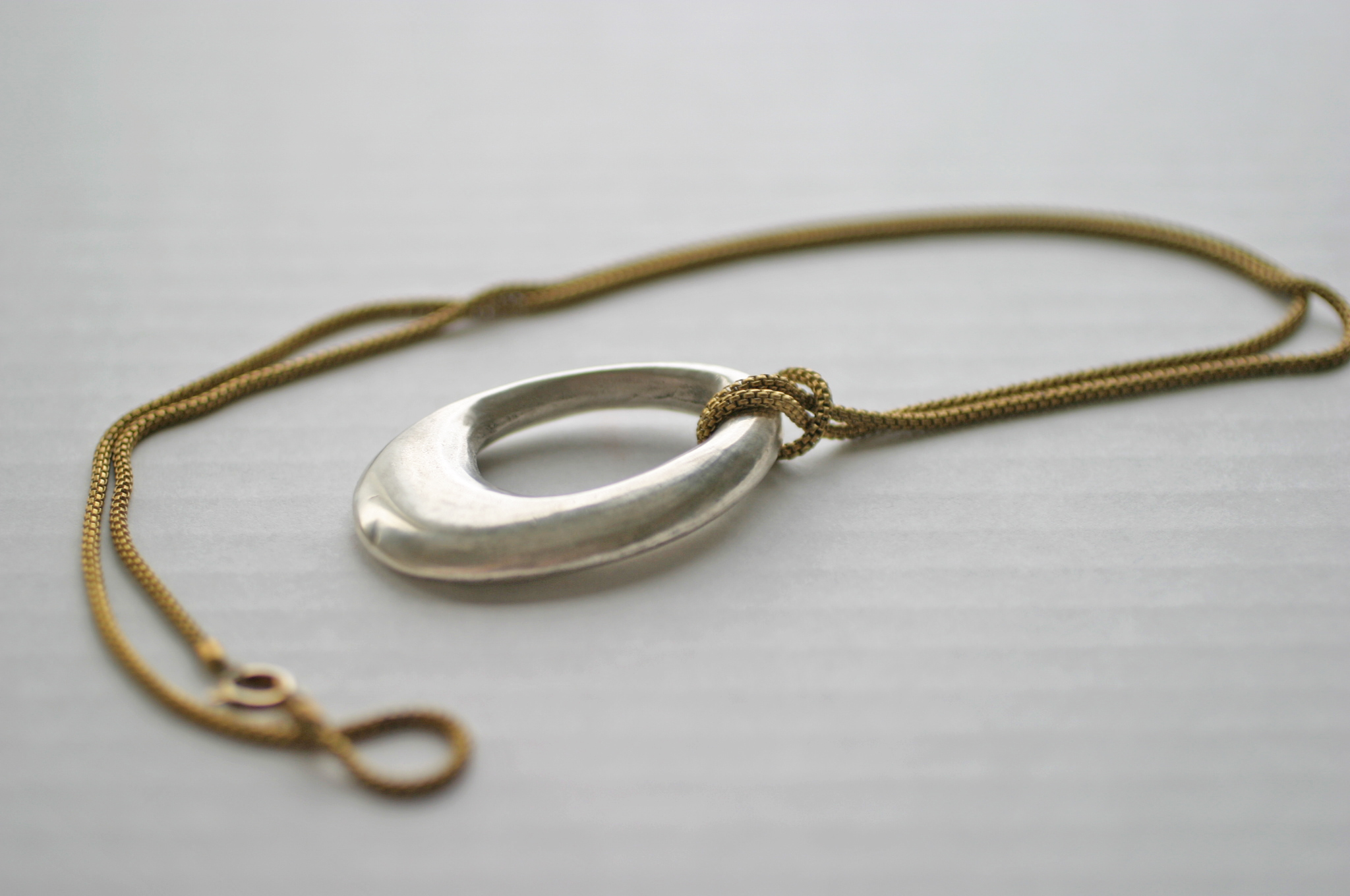 Elizabeth Baird Architecture-Jewelry-cast silver pendant.jpg