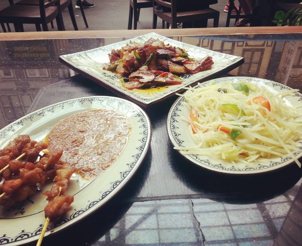 Chinatown's Food Street is a must for the tourists - sit, drink, eat your way through the day. This is from a Sichuan restaurant - chicken satay, potato stir fry and spicy pork stew.