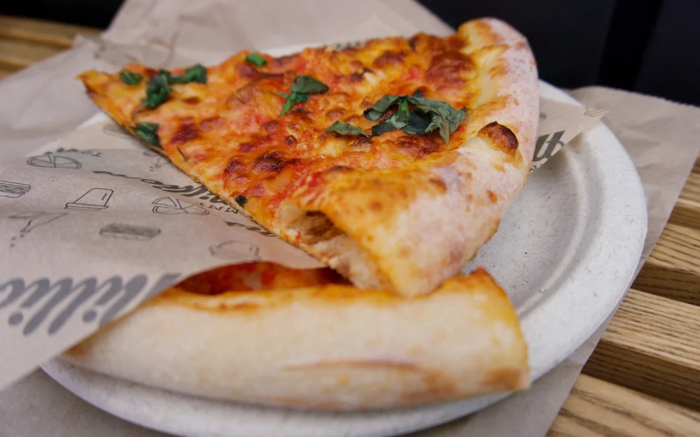 From Monday to Friday (check the times) you can get two Margherita pizza slices for $5 - how good is that?