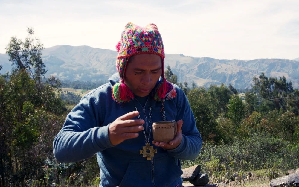 Christian blessing the cup of Wachuma.