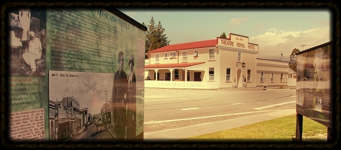 Information panels (foreground) and Theatre Royal Hotel (background), Kumara