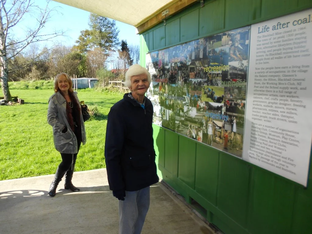 Kerrie & Pauline looking over an information panel at the Blackball musuem