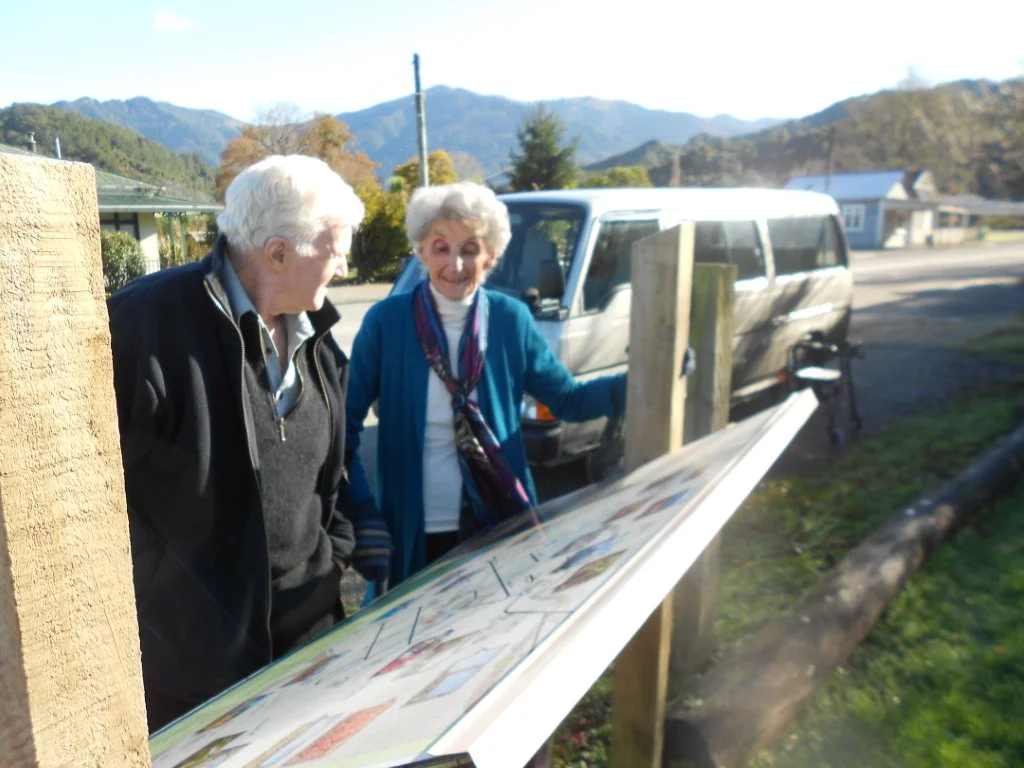 Pat Fitz & Phyl Stuart looking at an information panel on the history of Blackball