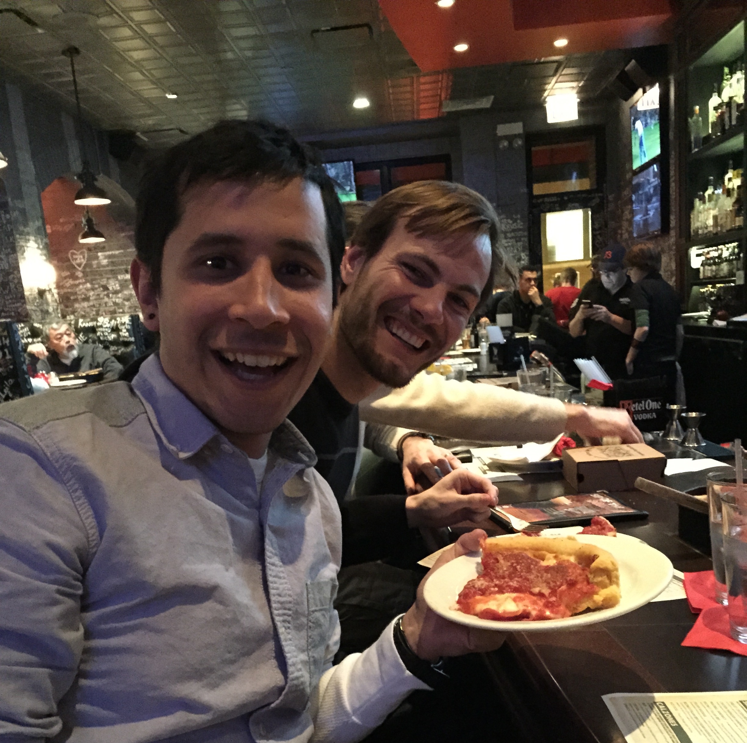 Eating some great Chicago deep dish pizza.