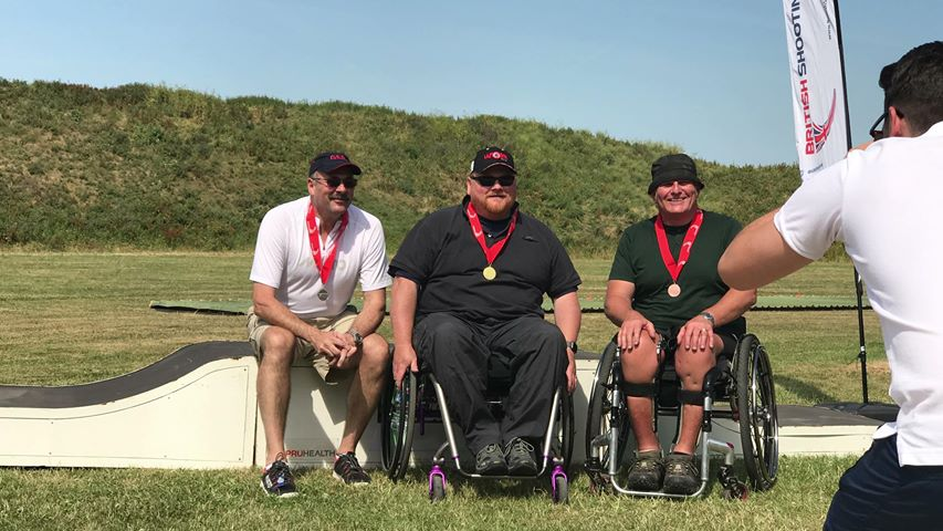 Allan (centre) winning gold