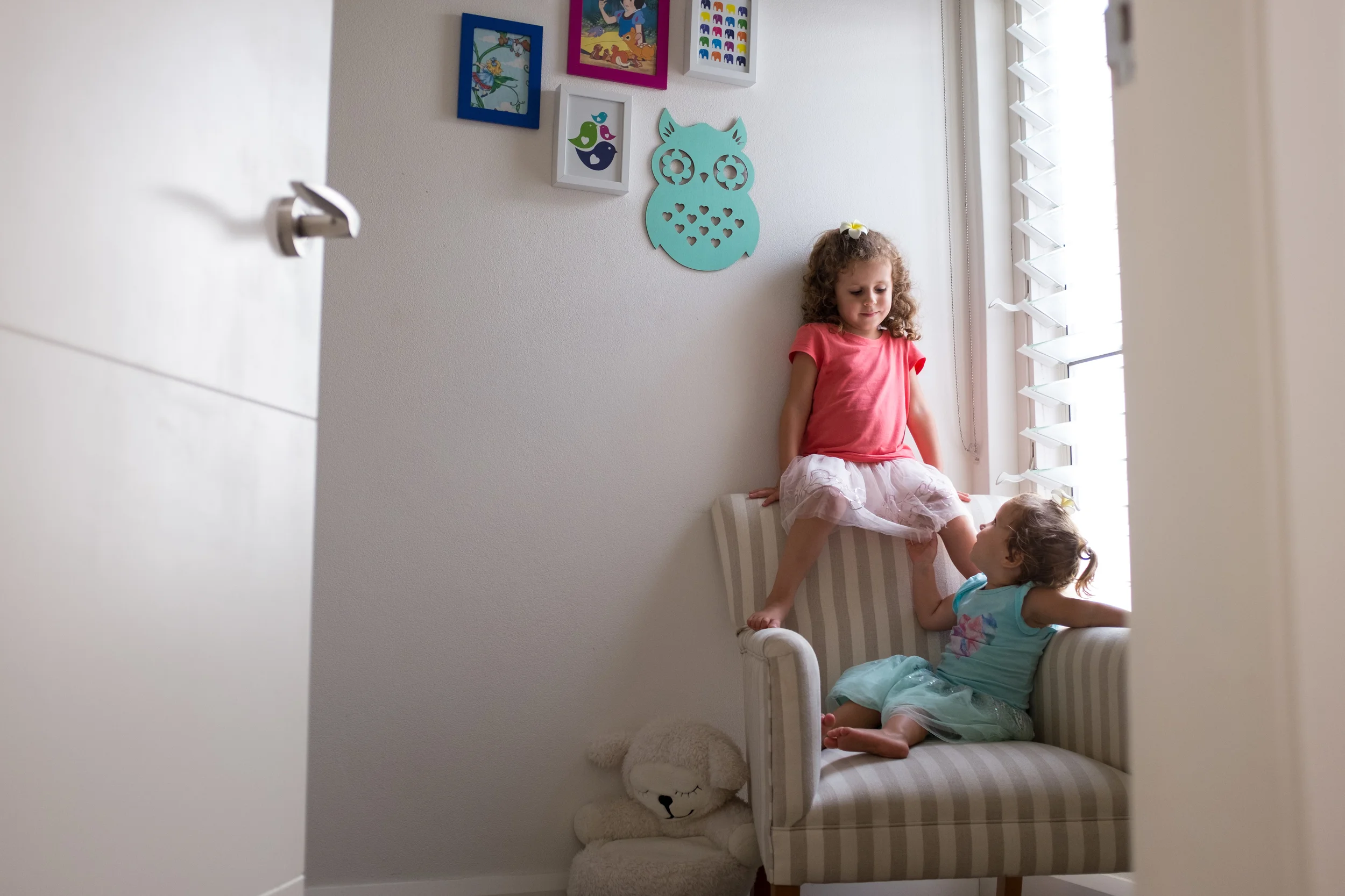 Using the "Baby Room" for gymnastics. Climbing on the chair and jumping in the cot.