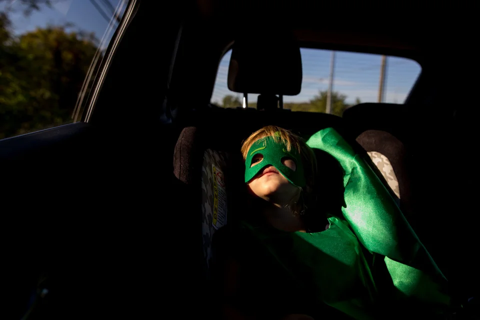 Superheroes ride in car seats