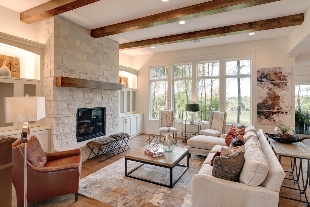 Our 2018 Home-A-Rama home mixed textiles as well as colors; warm reds and oranges mixing with cool creams.